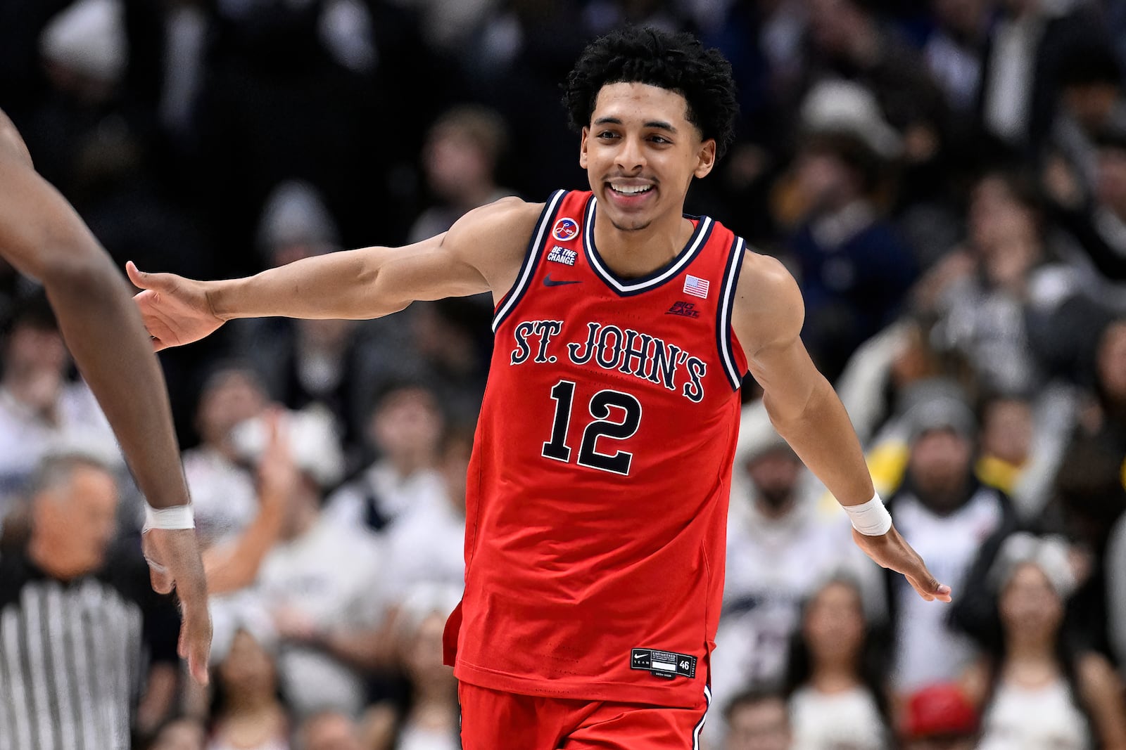 St. John's guard RJ Luis Jr. (12) celebrates at the end of an NCAA college basketball game against UConn, Friday, Feb. 7, 2025, in Storrs, Conn. (AP Photo/Jessica Hill)