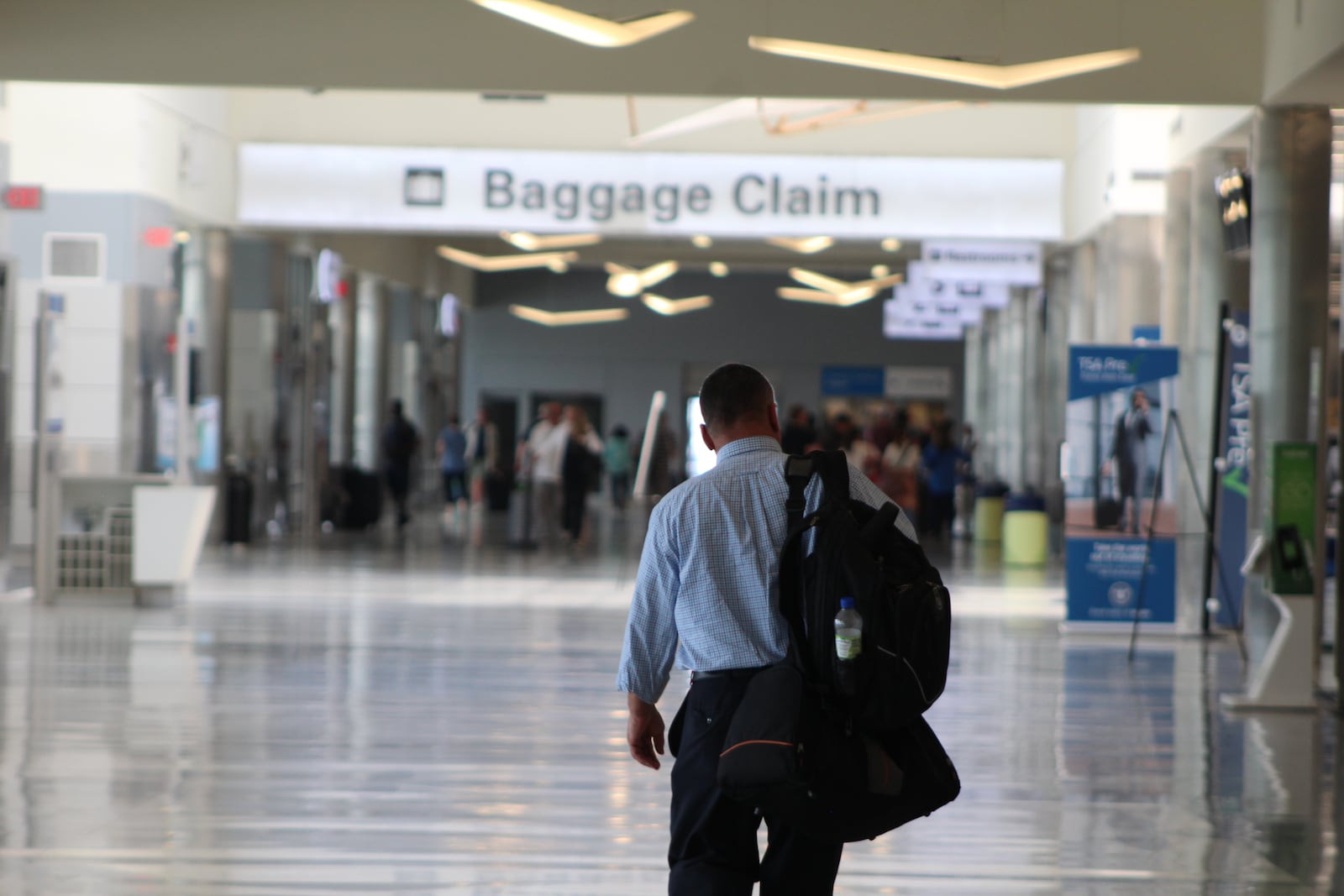 A traveler at the Dayton International Airport on Tuesday, May 23, 2023. CORNELIUS FROLIK / STAFF