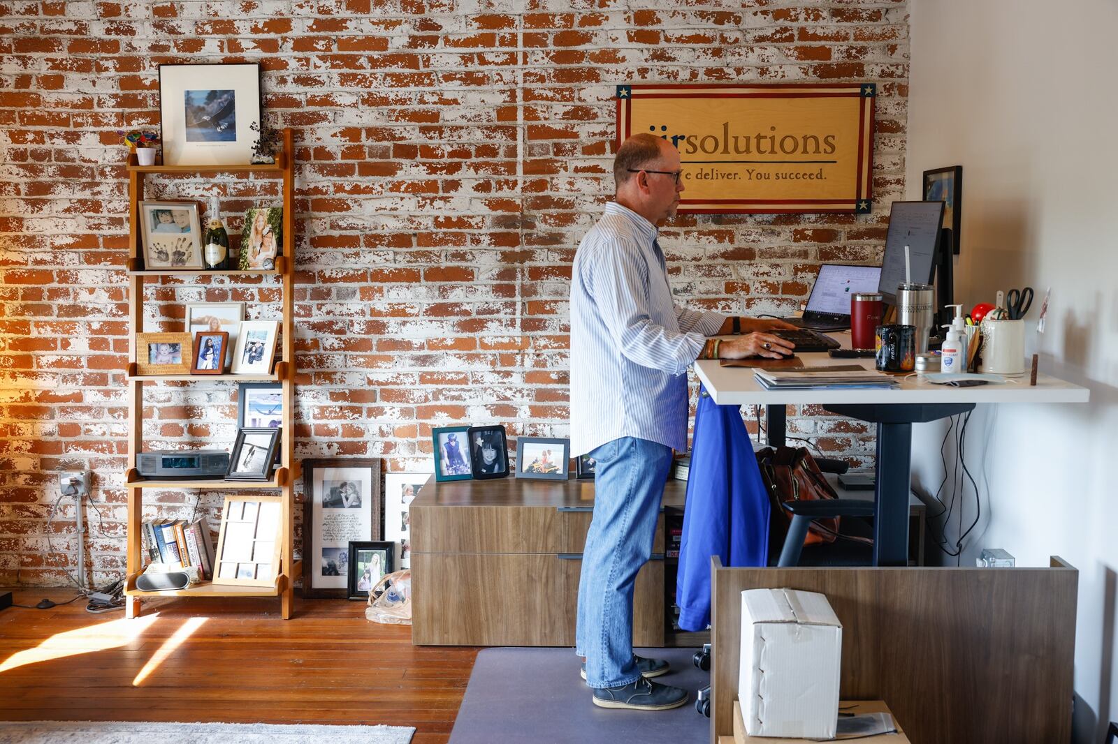 JJR Solutions C.E.O., Dave Judson works in his office in the Avant Garde Building on East Third Street in downtown Dayton. JIM NOELKER/STAFF