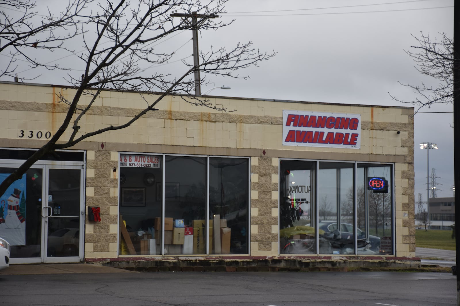 A developer proposes to convert this auto shop on Needmore Road in Dayton into a new marijuana dispensary with a drive-thru window. CORNELIUS FROLIK / STAFF