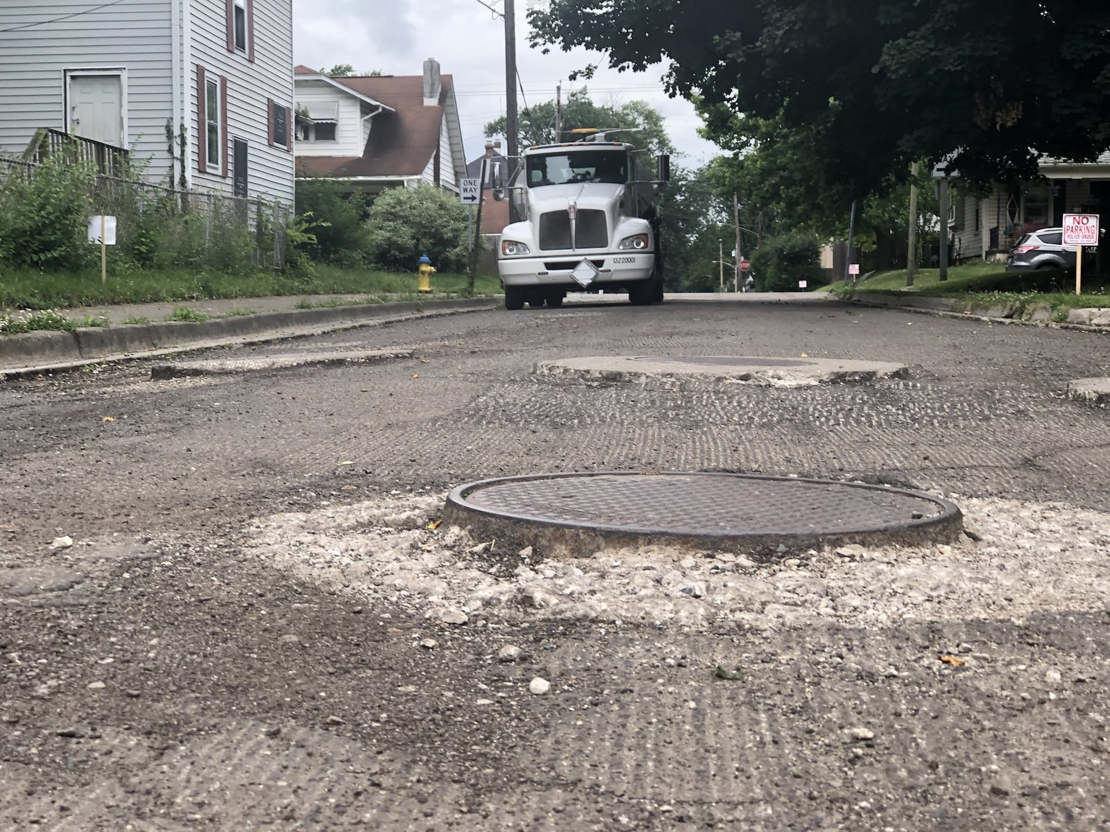 A street in Dayton’s Belmont neighborhood was grinded down in preparation to be repaved. A truck with A&B Asphalt was parked on the street. CORNELIUS FROLIK / STAFF