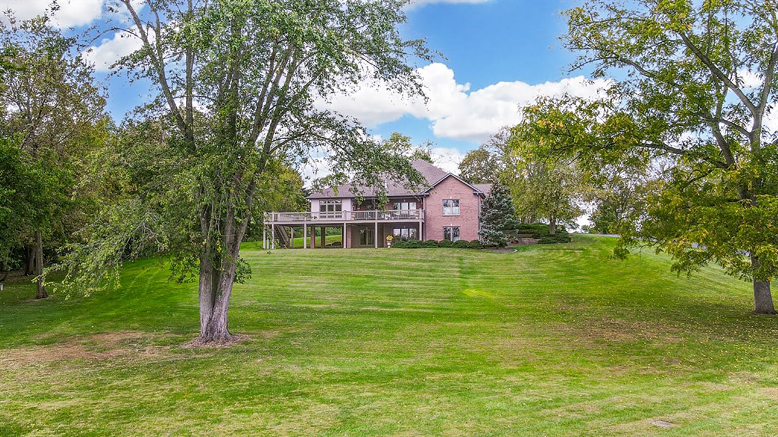 Using the landscape, the ranch has a full lower level that has the same panoramic views as the main level. A balcony deck and ground-level patio have both covered and sunny space with a staircase that connects the two levels. CONTRIBUTED PHOTO