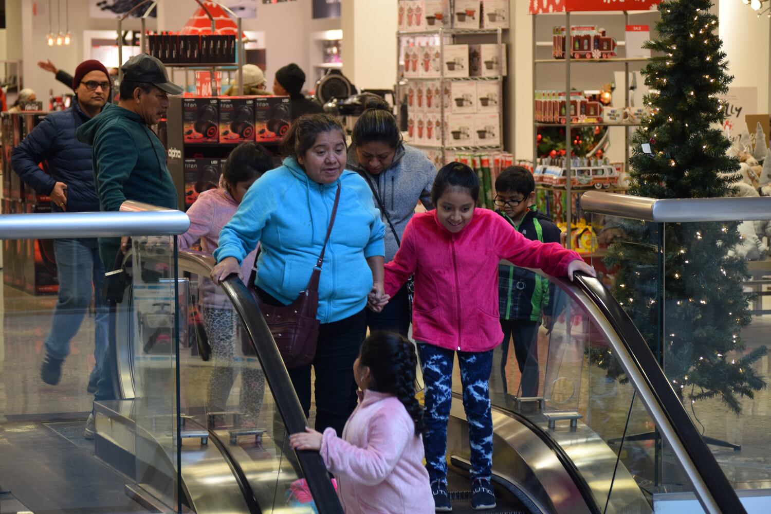 PHOTOS: Hundreds like up outside JCPenney for doorbusters, coupons