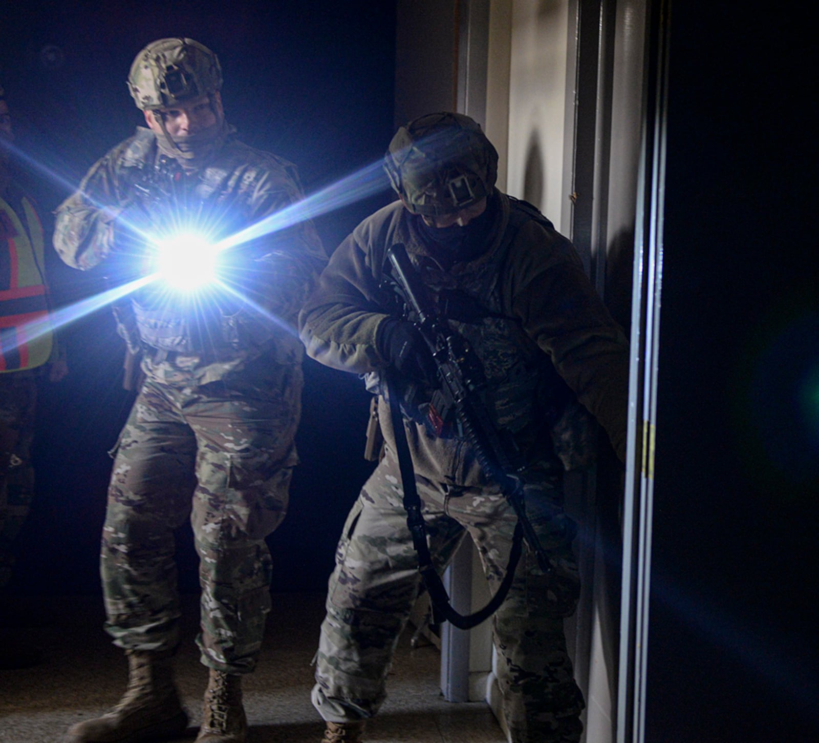 Members of the 88th Security Forces Squadron clear a building during an active-shooter exercise at Wright-Patterson Air Force Base on Feb. 24. U.S. AIR FORCE PHOTO/WESLEY FARNSWORTH