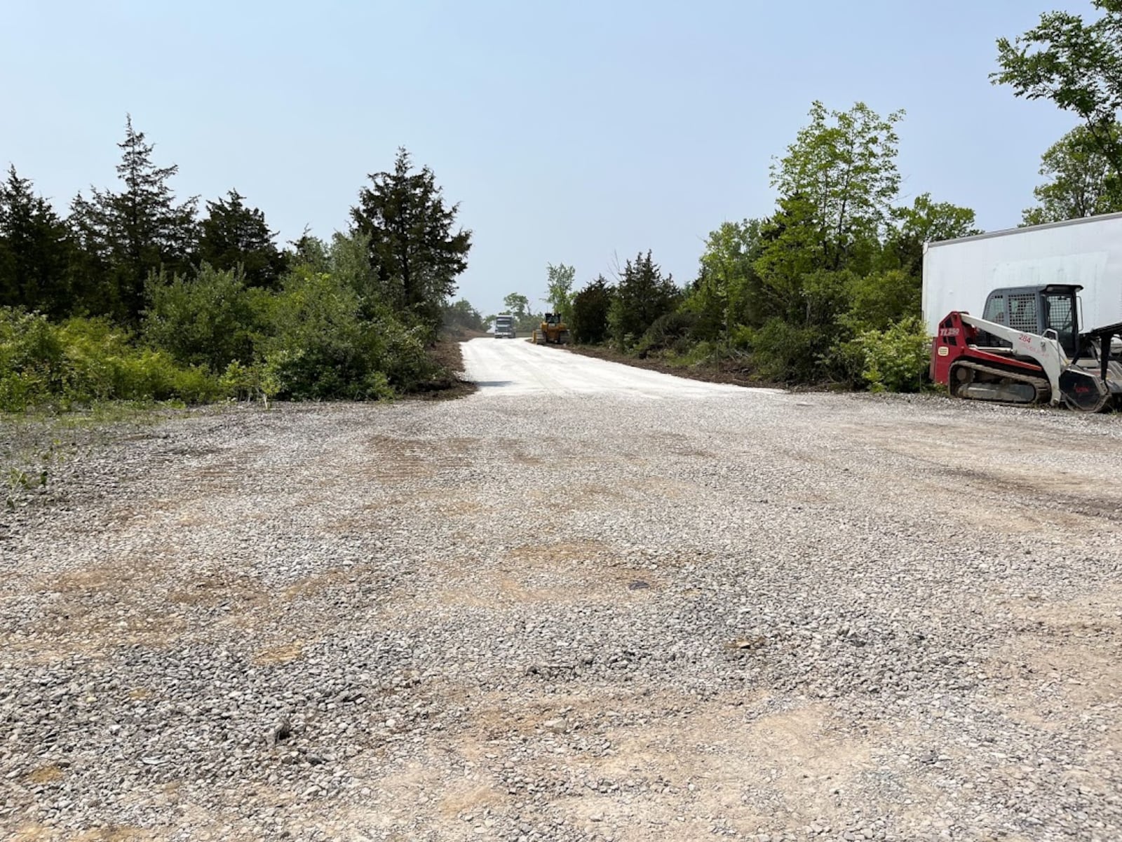 A new gravel road just east of the CenterPoint Energy Dayton Air Show's general admissions parking field off Northwoods Boulevard and North Dixie Drive. Air Show officials said Thursday motorists coming off Interstate 75 onto Northwoods this summer will be able to access general admissions parking much earlier, near where Engle Road meets Northwoods. THOMAS GNAU/STAFF