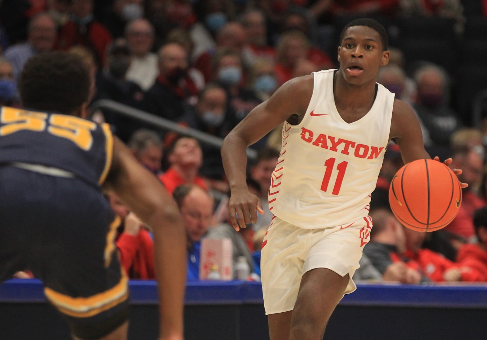 Dayton's Malachi Smith dribbles against Cedarville in an exhibition game on Monday, Nov. 1, 2021, at UD Arena. David Jablonski/Staff