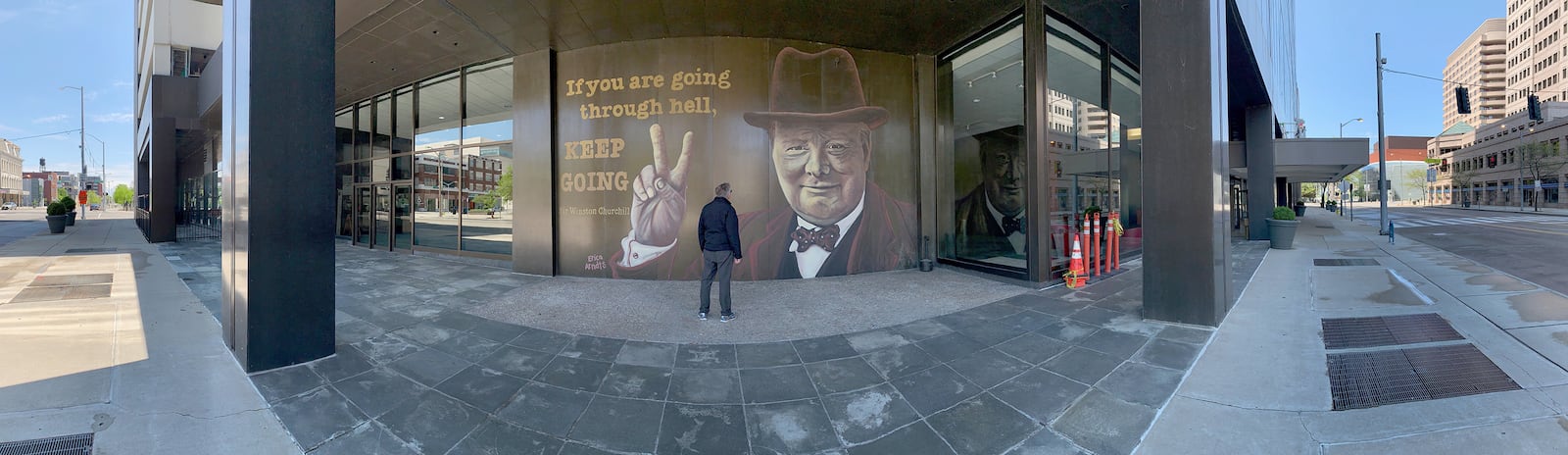 Winston Churchill, prime minister of Great Britain during much of World War II, is the subject of the latest downtown Dayton mural on the Stratacache Tower. The image of Churchill, painted by mural artist Erica Arndts, is accompanied by a quote he is associated with, âIf you are going through hell, keep going.â LISA POWELL / STAFF