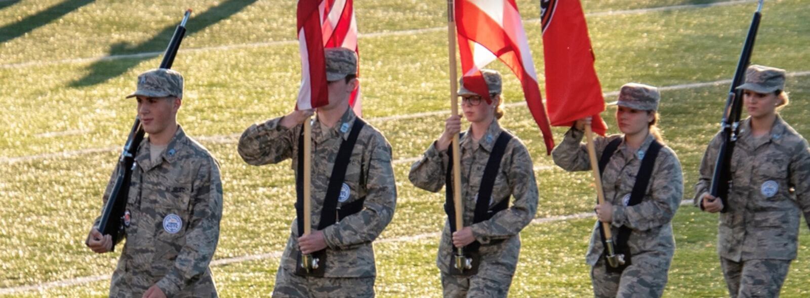 Aaron Staiger (front) leads the Air Force Junior ROTC Honor Guard as it presents the colors before Beavercreek High School’s home football game on Sept. 10. Staiger is a cadet lieutenant colonel and deputy commander in the JROTC unit. CONTRIBUTED PHOTO