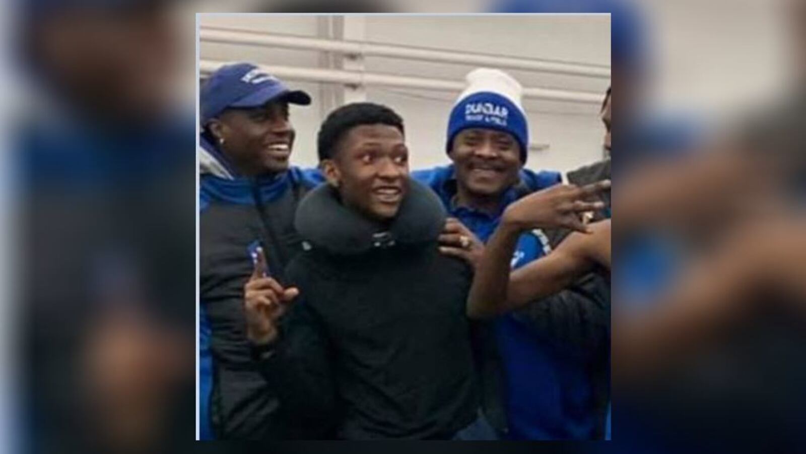 Qua'Lek Shelton (middle) with his Dunbar High School track and field teammates. (Courtesy/Coach Sidney Booker)