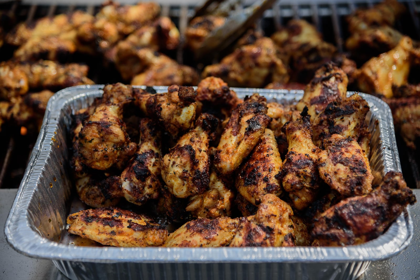 The Fraze Pavilion was the hottest place to be this weekend as the Seventh Annual Kickin' Chicken Wing Fest celebrated some of the best in chicken wings in the Miami Valley. While festival-goers tasted various chicken wings, live music entertained on the Fraze stage. TOM GILLIAM / CONTRIBUTING PHOTOGRAPHER