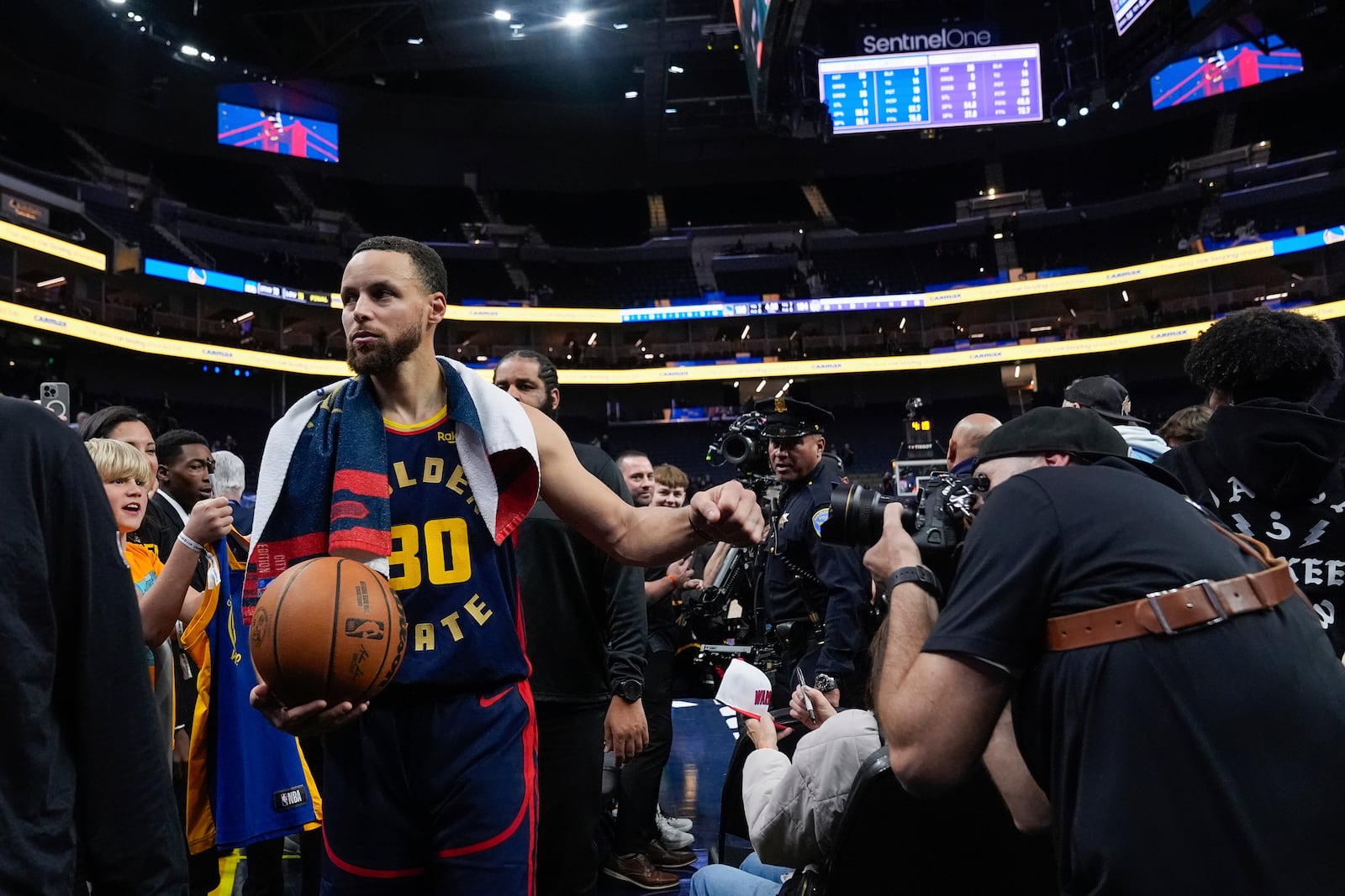 Golden State Warriors guard Stephen Curry (30) walks off the court after the team's victory over the Sacramento Kings in an NBA basketball game Thursday, March 13, 2025, in San Francisco. (AP Photo/Godofredo A. Vásquez)