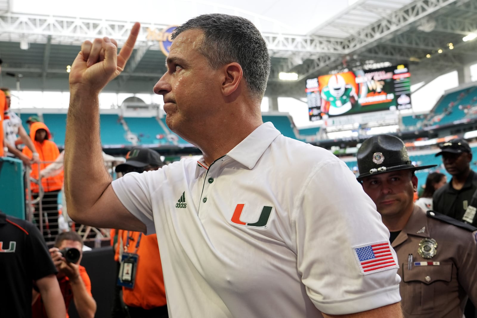 Miami head coach Mario Cristobal walks off the field after an NCAA college football game against Duke, Saturday, Nov. 2, 2024, in Miami Gardens, Fla. (AP Photo/Lynne Sladky)