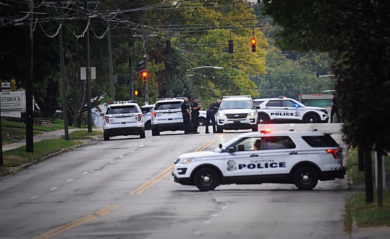 A man is in critical condition after he was shot by police on Wayne Avenue in Dayton on Thursday, Sept. 24, 2020. STAFF PHOTO / MARSHALL GORBY