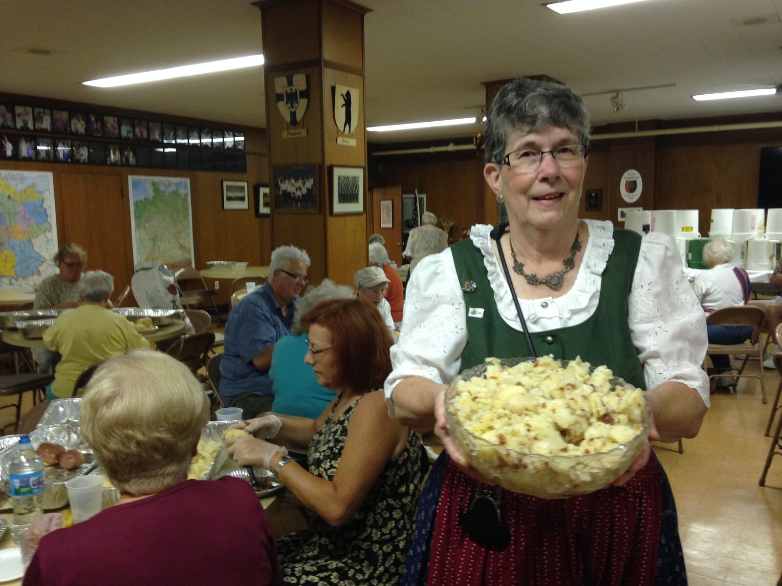 Dayton Liederkranz-Turner’s Germanfest publicity chair Judy Schneider holds freshly made potato salad. (Staff photo by Amelia Robinson)