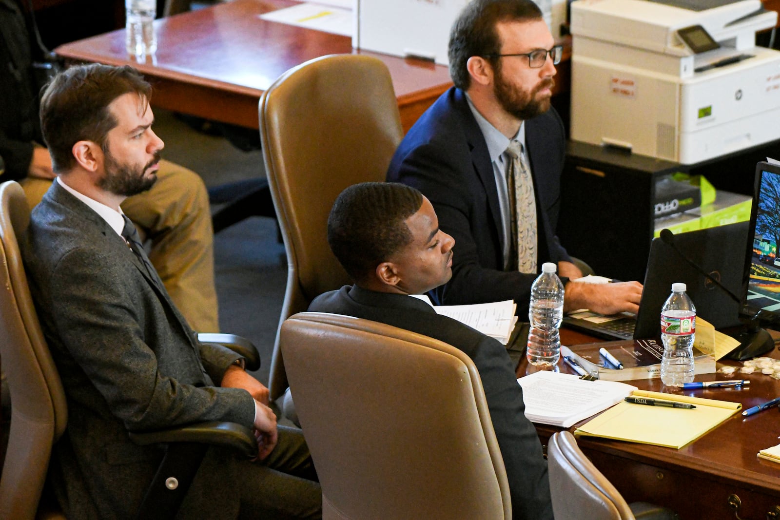 Sheldon Timothy Herrington Jr., foreground, who is on trial for the murder of University of Mississippi student Jimmie "Jay" Lee, looks over at his attorney in Oxford, Miss. on Tuesday, Dec. 3, 2024. (Bruce Newman/The Northeast Daily Journal via AP, Pool)