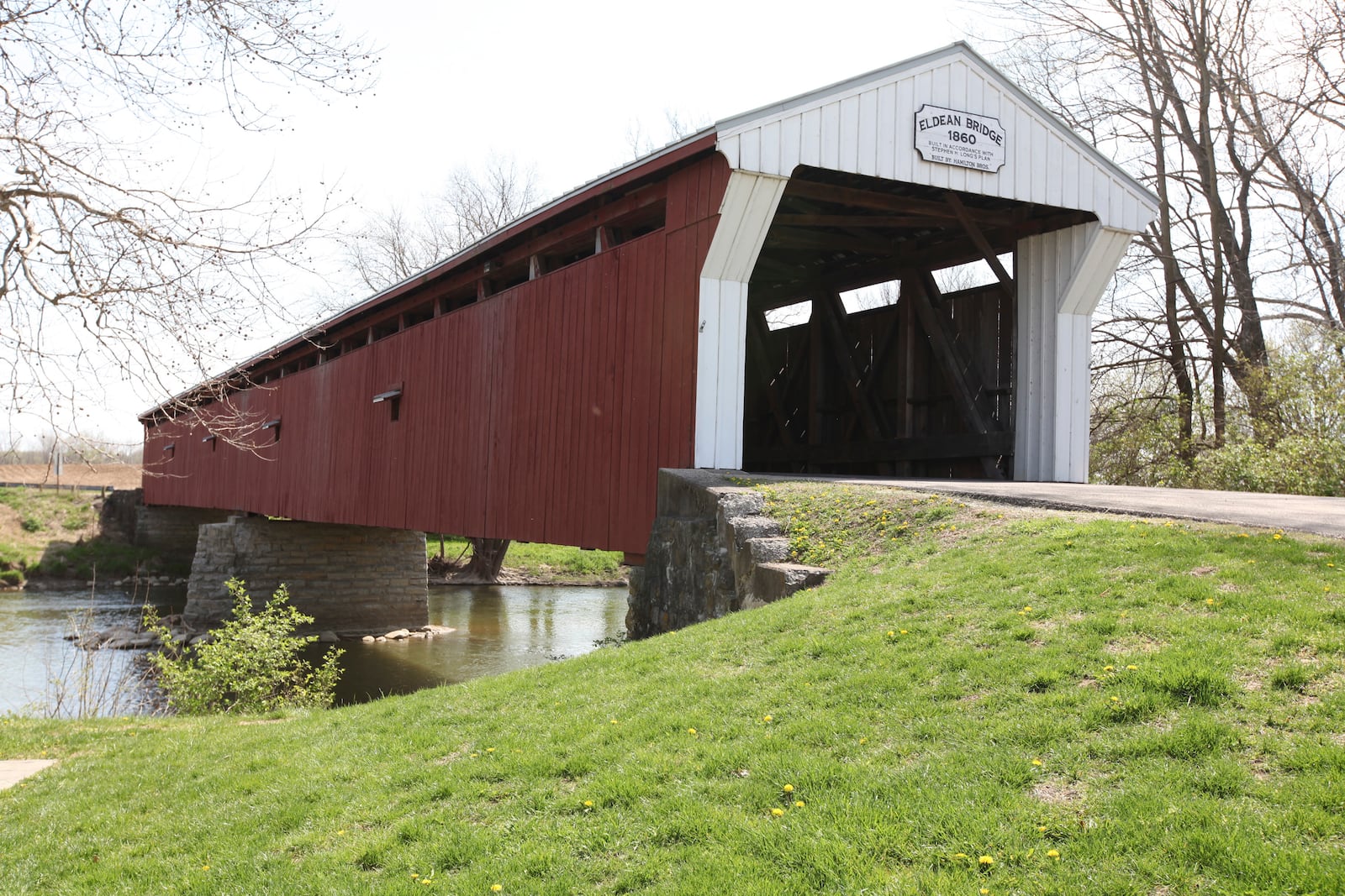 The Eldean covered bridge, built in 1860, still carries traffic across the Great Miami River in Troy, Ohio; April 25, 2016 (Dispatch photo by Steve Stephens)