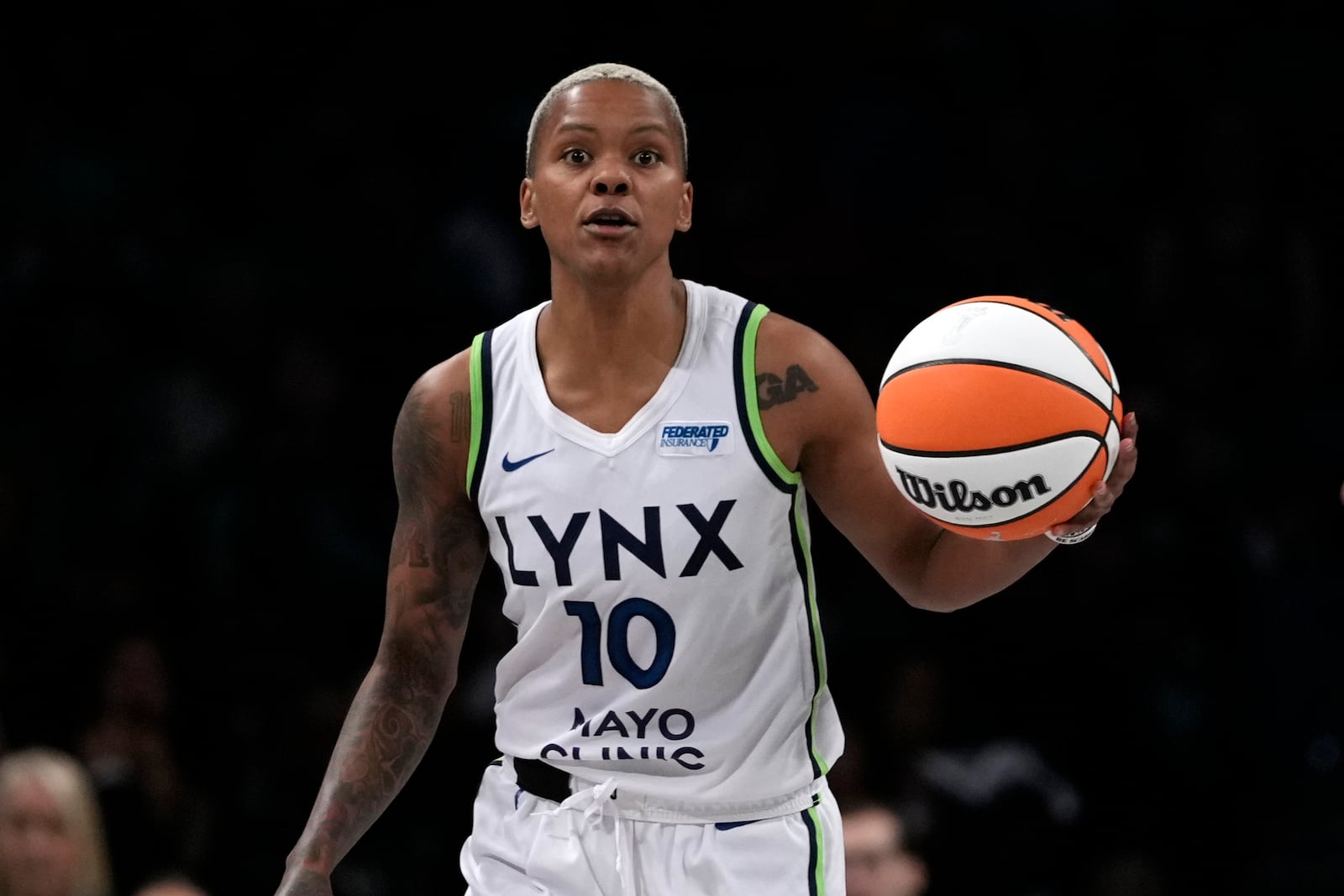 Minnesota Lynx's Courtney Williams dribbles during the second half in Game 1 of a WNBA basketball final playoff series against the New York Liberty, Thursday, Oct. 10, 2024, in New York. (AP Photo/Pamela Smith)