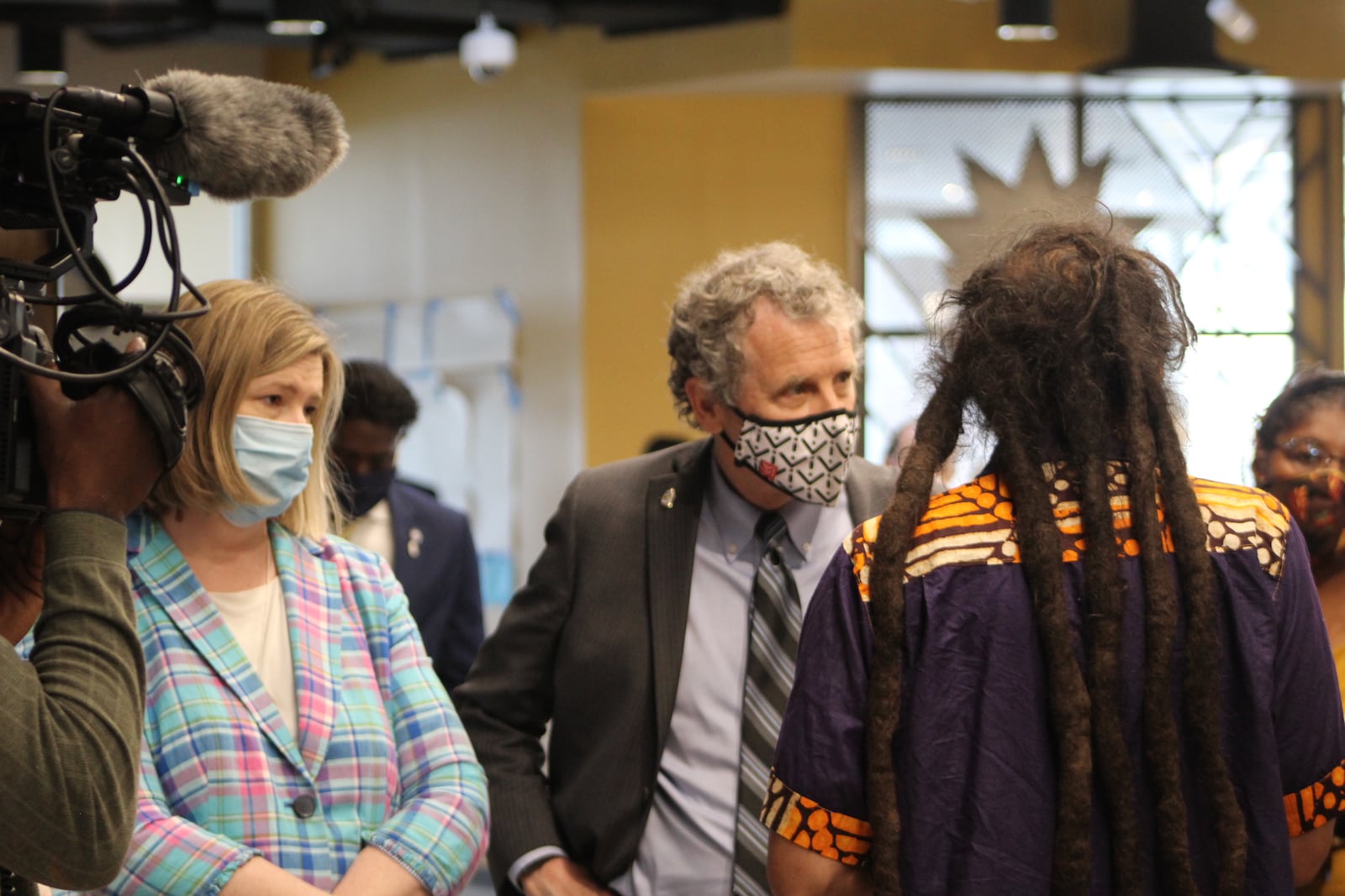 Sen. Sherrod Brown and Dayton Mayor Nan Whaley tour the Gem City Market on Friday. CORNELIUS FROLIK / STAFF