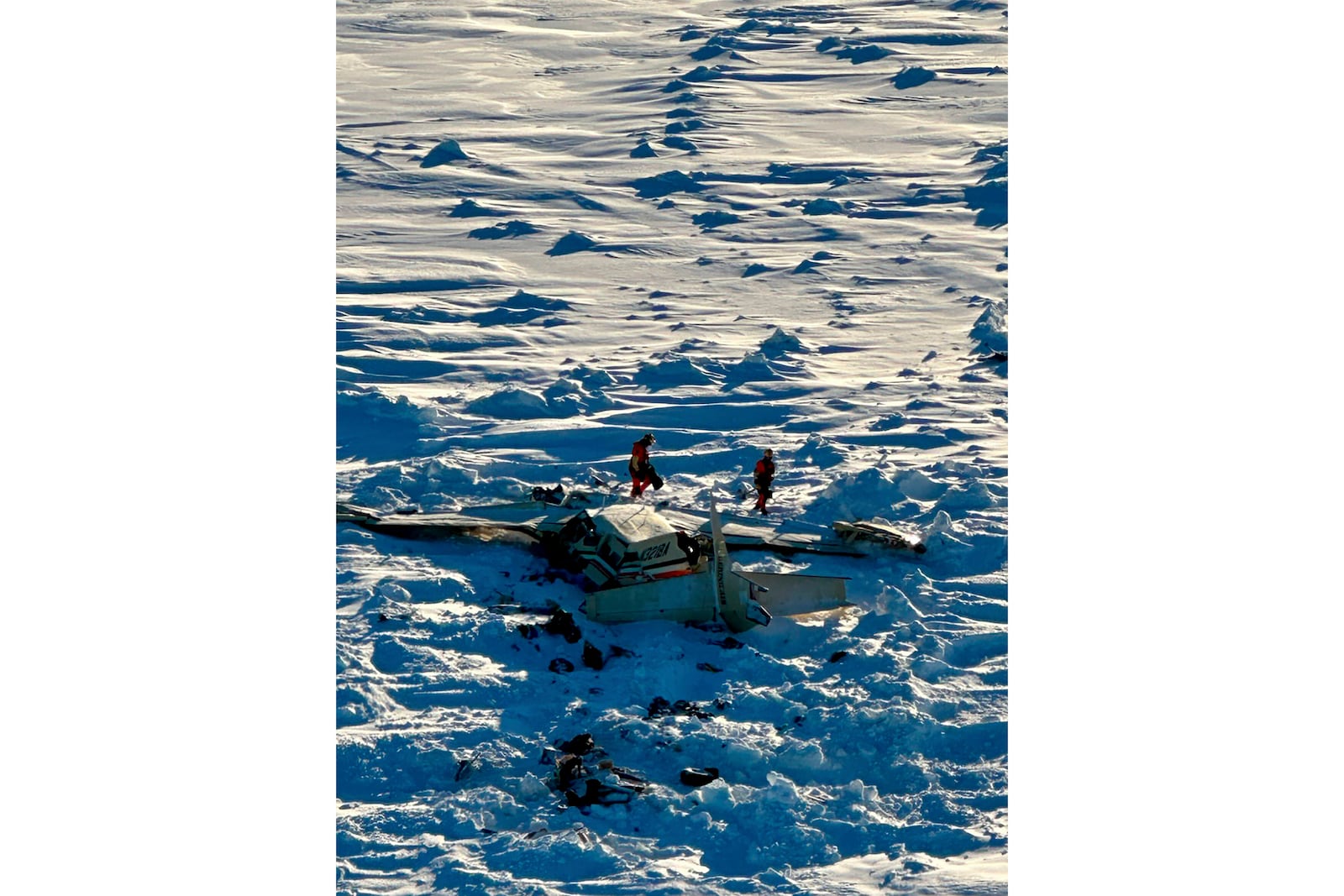 This photo provided by the U.S. Coast Guard on Feb. 7, 2025, shows a small commuter plane that crashed in western Alaska on a flight that was bound for the hub community of Nome. (U.S. Coast Guard via AP, File)