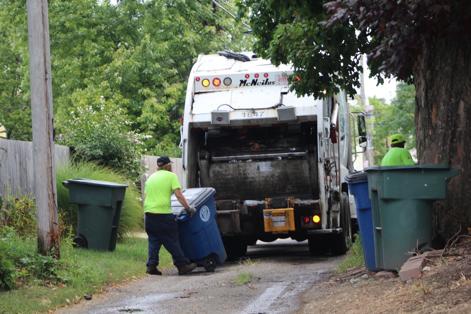 Waste collection crews in Dayton. CORNELIUS FROLILK / STAFF