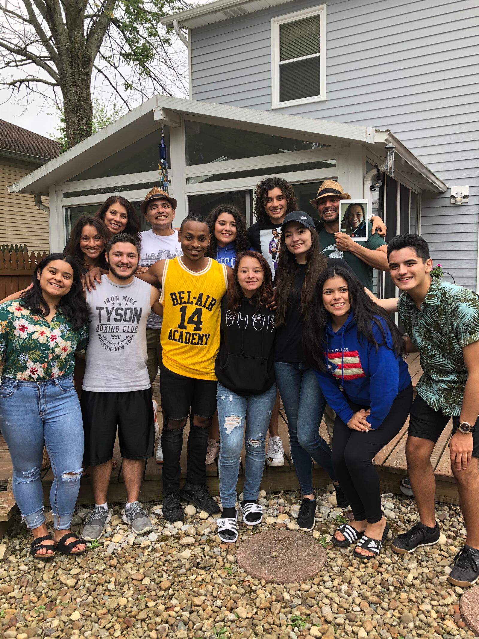 Adopted at birth, Lucianna Seed (second from left back row) recently met family members she never knew she had, including Centerville's Raquel Rivera-Hill (left back row) and her children Antonio Rivera-Hill (second from left front row), Stefan Rivera-Clack (third from left front row) and Yadira Rivera-Hill (forth from left front row).  The sisters met up with a list of family members that include their brothers Marcos and Daniel Rivera in the Cleveland area where Marcos resides.