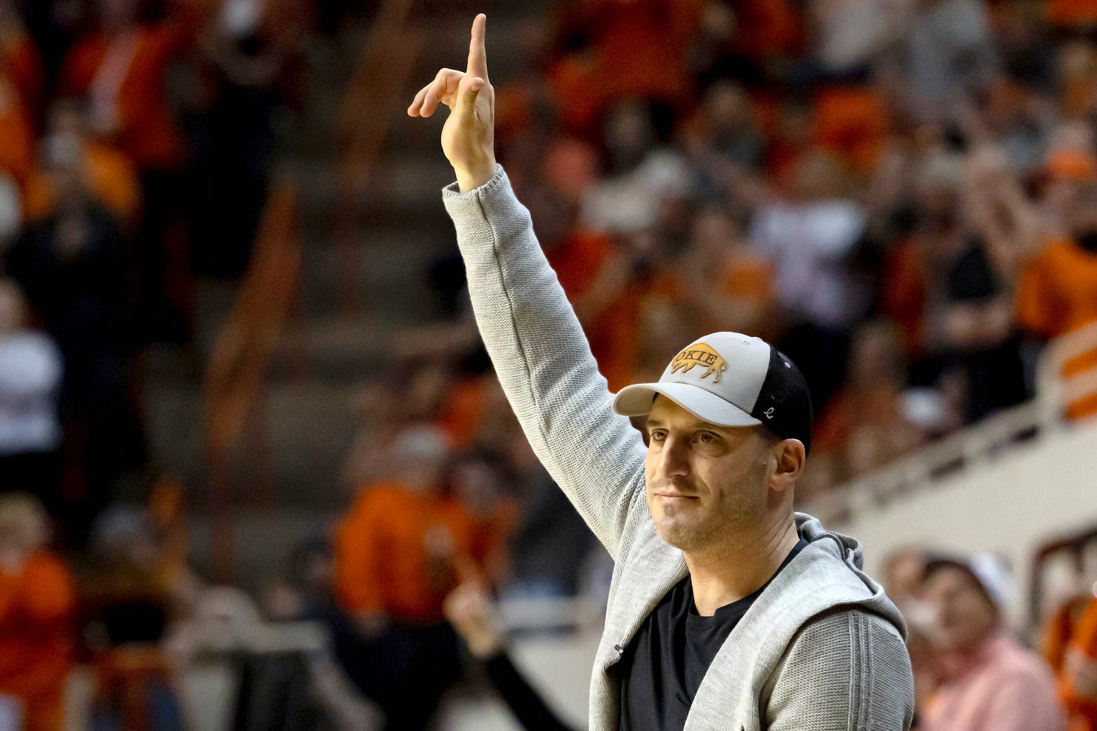 FILE - Oklahoma State alumnus Doug Gottlieb is acknowledged during the second half of the NCAA college basketball game against Oklahoma in Stillwater, Okla., Wednesday, Jan. 18, 2023. The longtime basketball radio analyst will make his college head coaching debut next season at Green Bay, the school announced Tuesday, May 14, 2024. Gottlieb will take over for Sundance Wicks, who left the Phoenix after one year to take over Wyoming’s program. (AP Photo/Mitch Alcala, FIle)