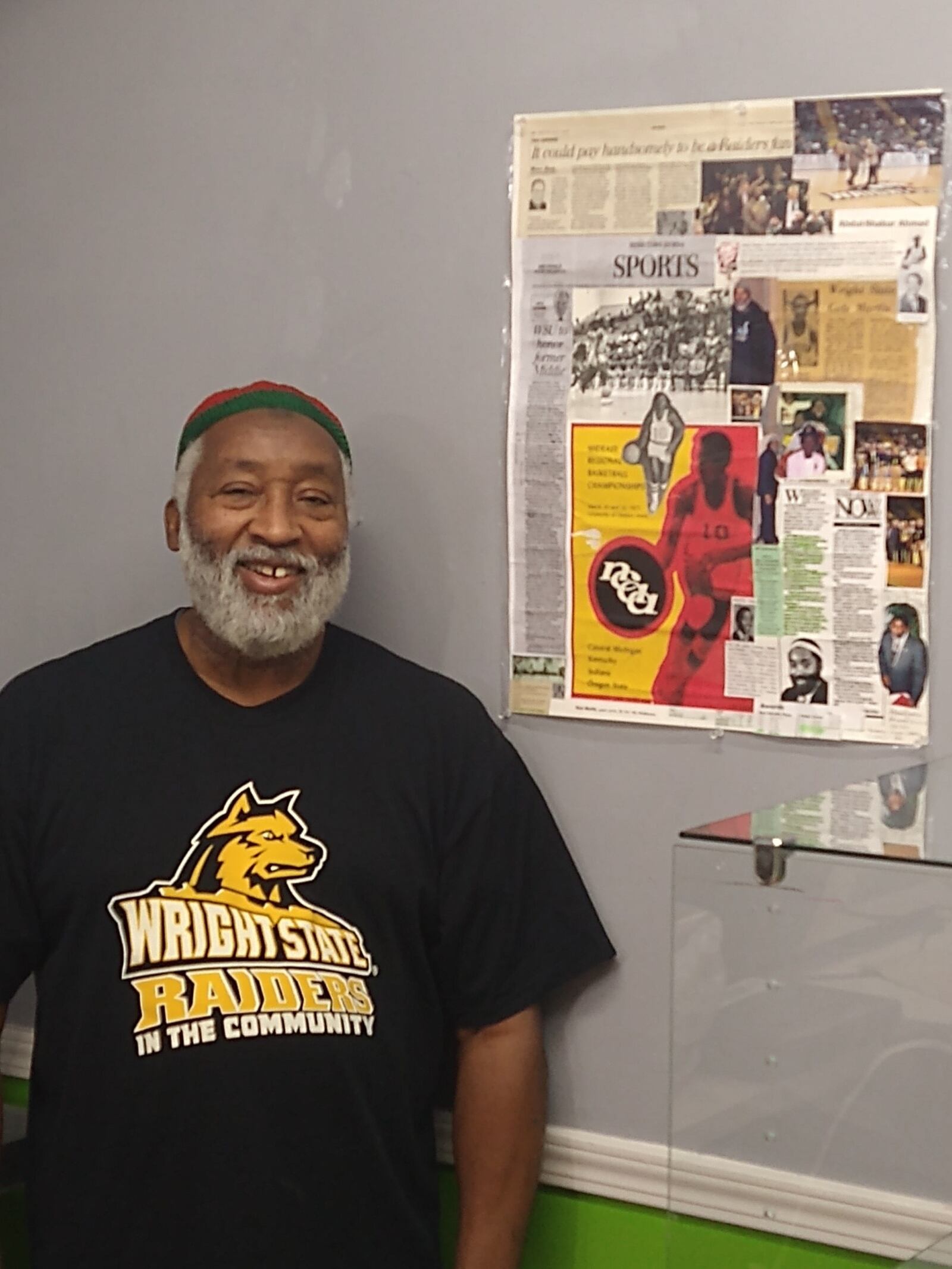 Abdul Shakur Ahmad – standing next to a montage of his hoops career -- is helping coordinate the Black History month festivities which begin today at the Pendleton Art Center in Middletown. He’s used his sports career as a platform over the years and although he lives in Dayton’s Oregon District, he remains a community/social activist in Middletown, his hometown. He was the first African American to get a basketball scholarship at WSU and is in the school’s athletic Wall of Fame.. He scored 1,182 points for the Raiders and remains second in career steals and steals in a season at WSU. Michael G. Armour Jr./CONTRIBUTED