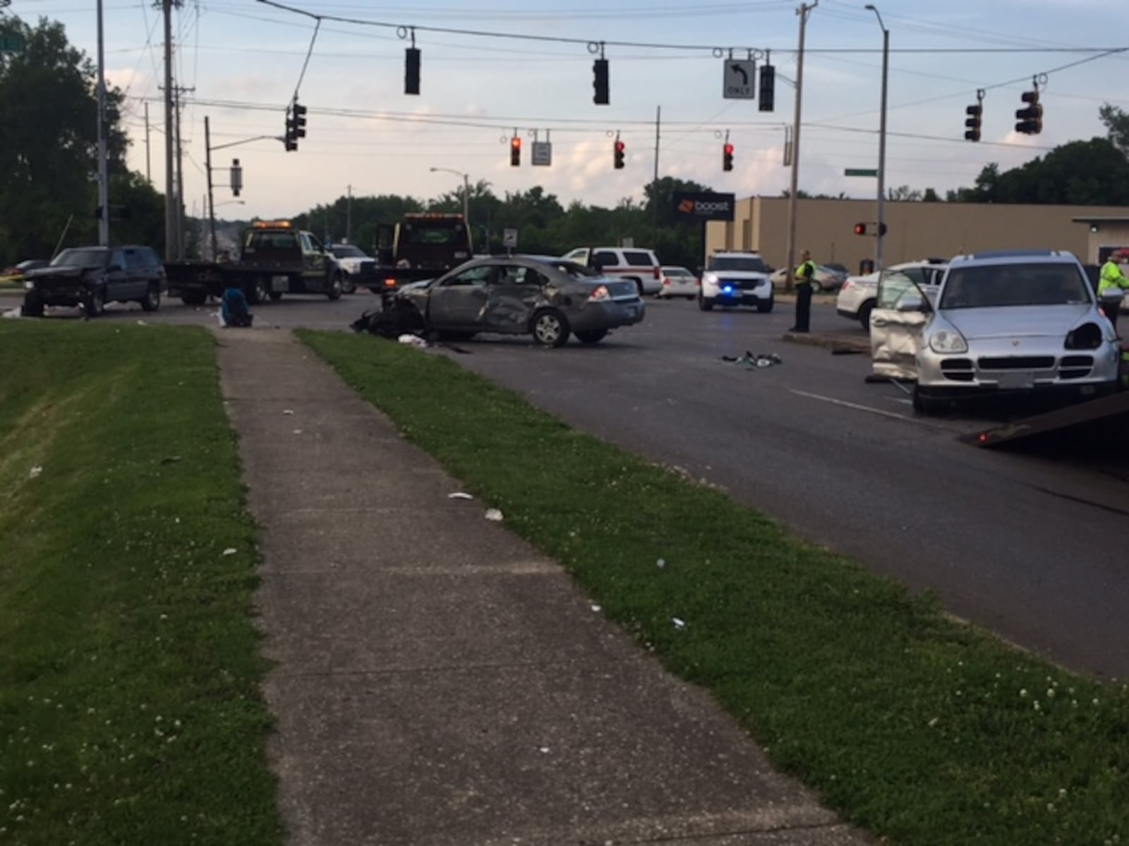 Two infants were trapped when a car driven by a woman flipped onto its side in a four-vehicle crash Saturday evening, May 27, 2017, in Dayton. Police said the driver of a Porsche ran a red light on North Gettysburg Avenue and struck three vehicles before fleeing. DeANGELO BYRD / STAFF