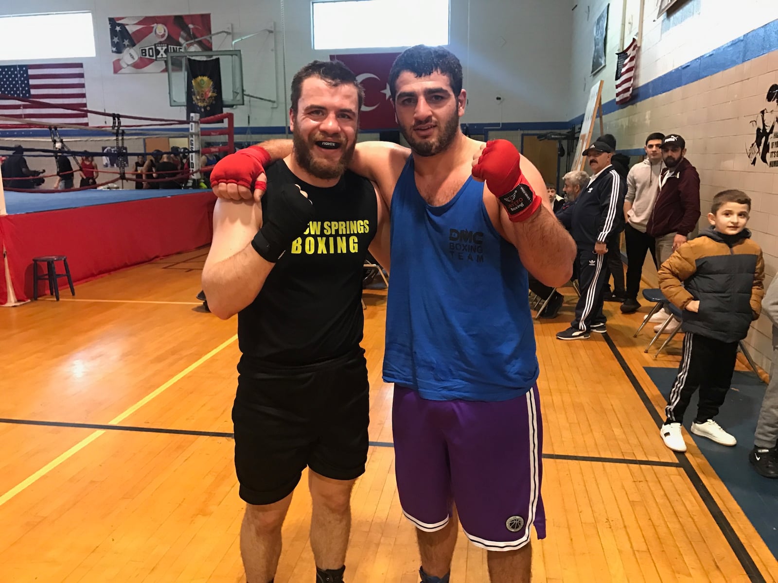 Sam wildenhaus (left) and Dzhamal Usmanov after their spirited main event bout Sunday. Tom Archdeacon/CONTRIBUTED