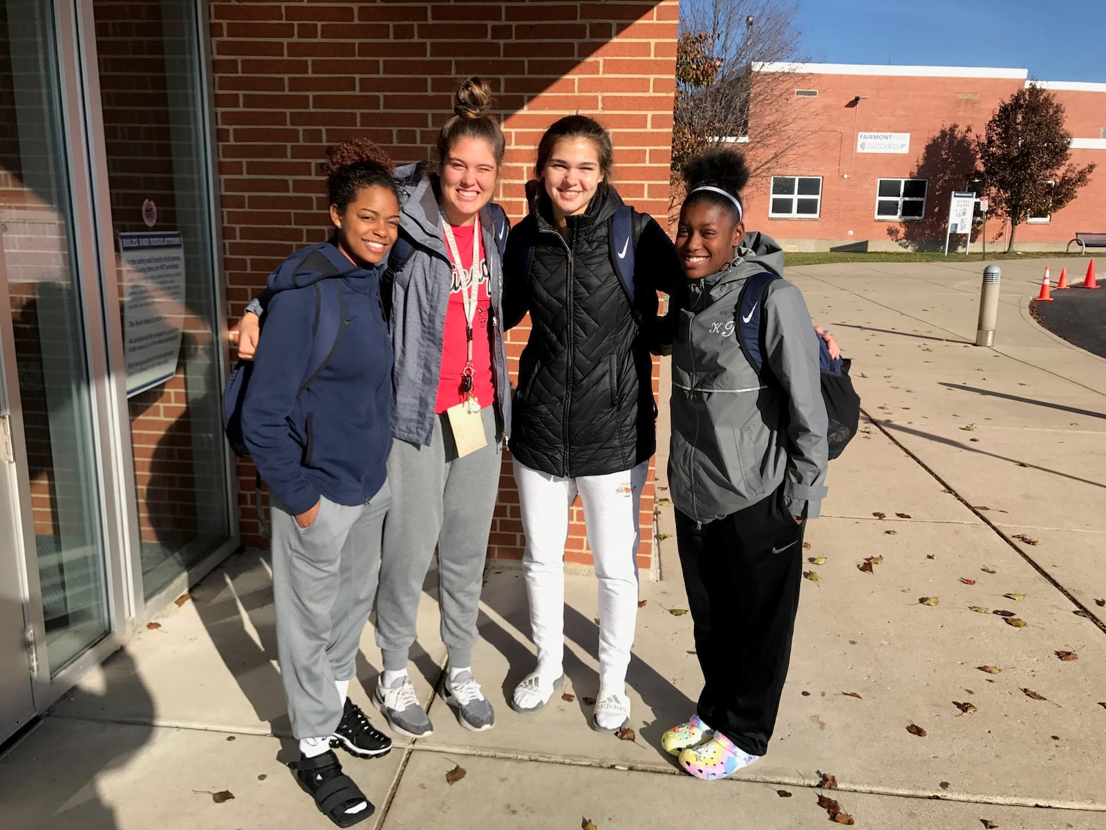 Fairmont High School teammates (left to right) Makira Webster, Madison Bartley, Maddie Westbeld and Kierra Thornton outside Trent Arena after a practice Monday. Tom Archdeacon/CONTRIBUTED