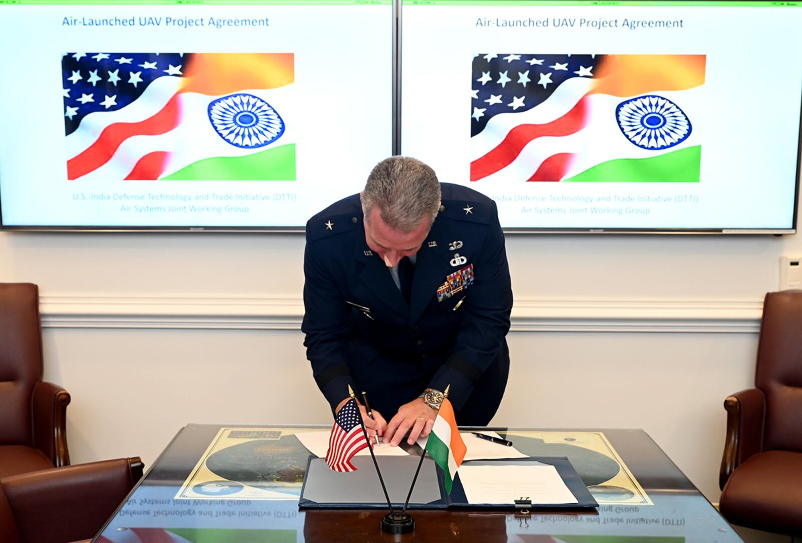 Co-chair of the U.S.-India Defense Technology and Trade Initiative Brig. Gen. Brian Bruckbauer signs the Air Launched UAV Co-Development Agreement at the Pentagon, Arlington, Va., July 16, 2021. U.S. AIR FORCE PHOTO/ANDY MORATAYA