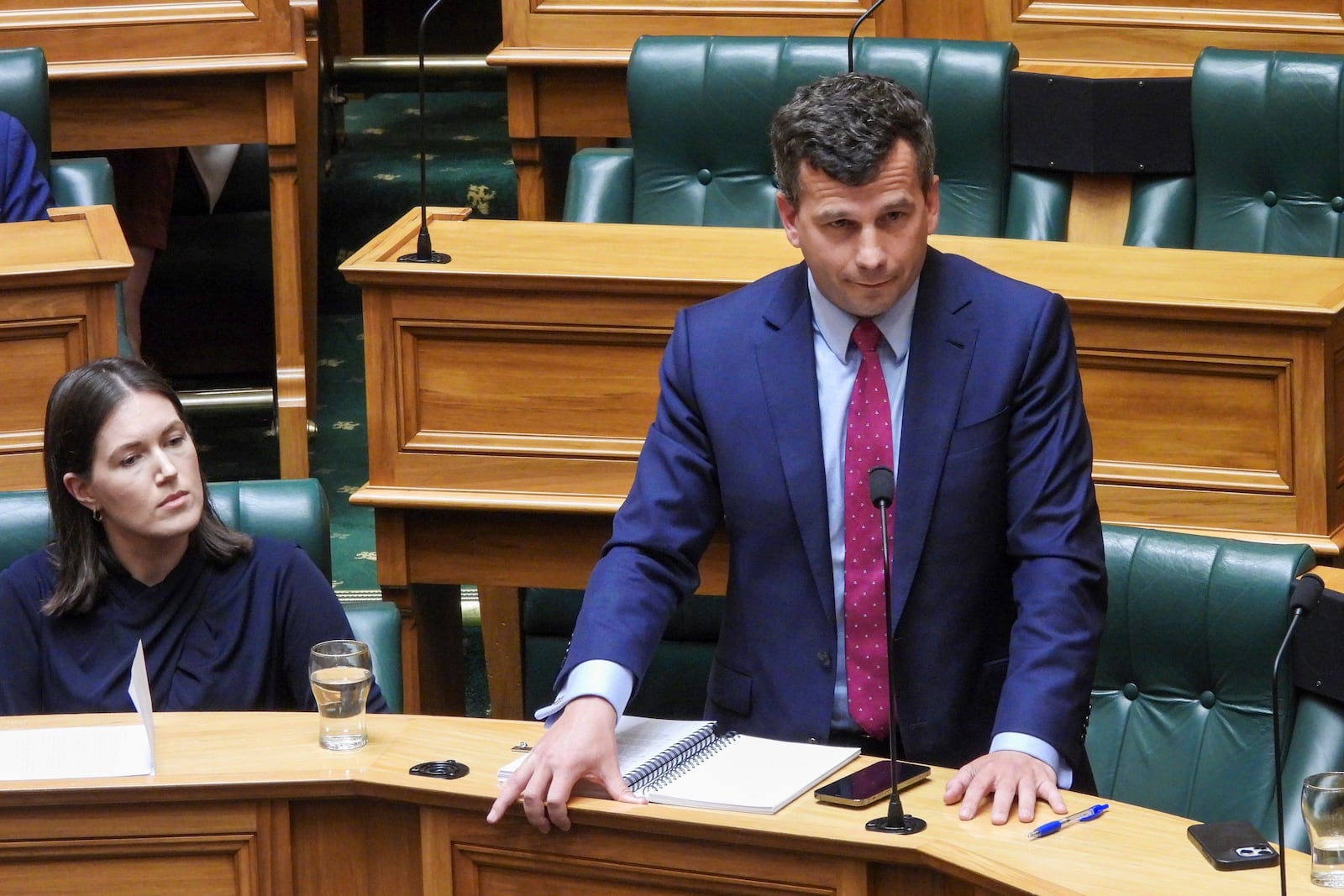 ACT Party leader David Seymour stands during the first debate on the Treaty Principal Bill in Parliament in Wellington, New Zealand, Thursday, Nov. 14, 2024. (AP Photo/Charlotte McLay-Graham)