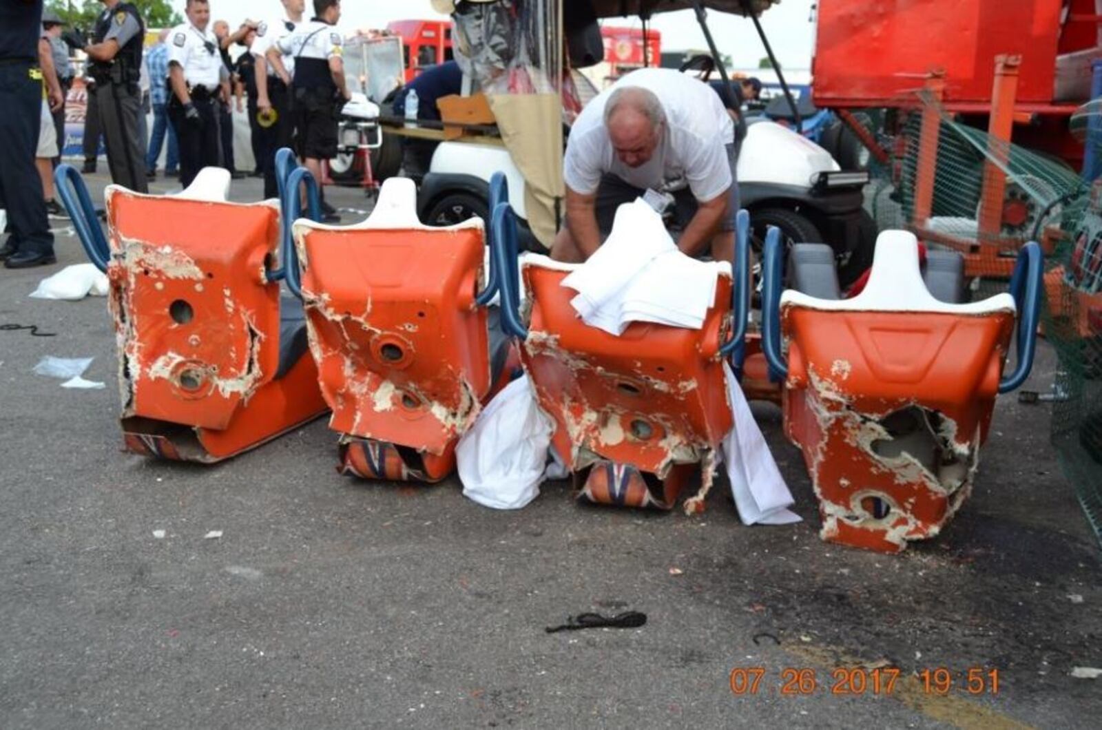 These damaged seats were attached to the gondola arm that broke off from the Fire Ball ride at the Ohio State Fair on July 26. The ride was builtin 1998. [OHIO HIGHWAY PATROL