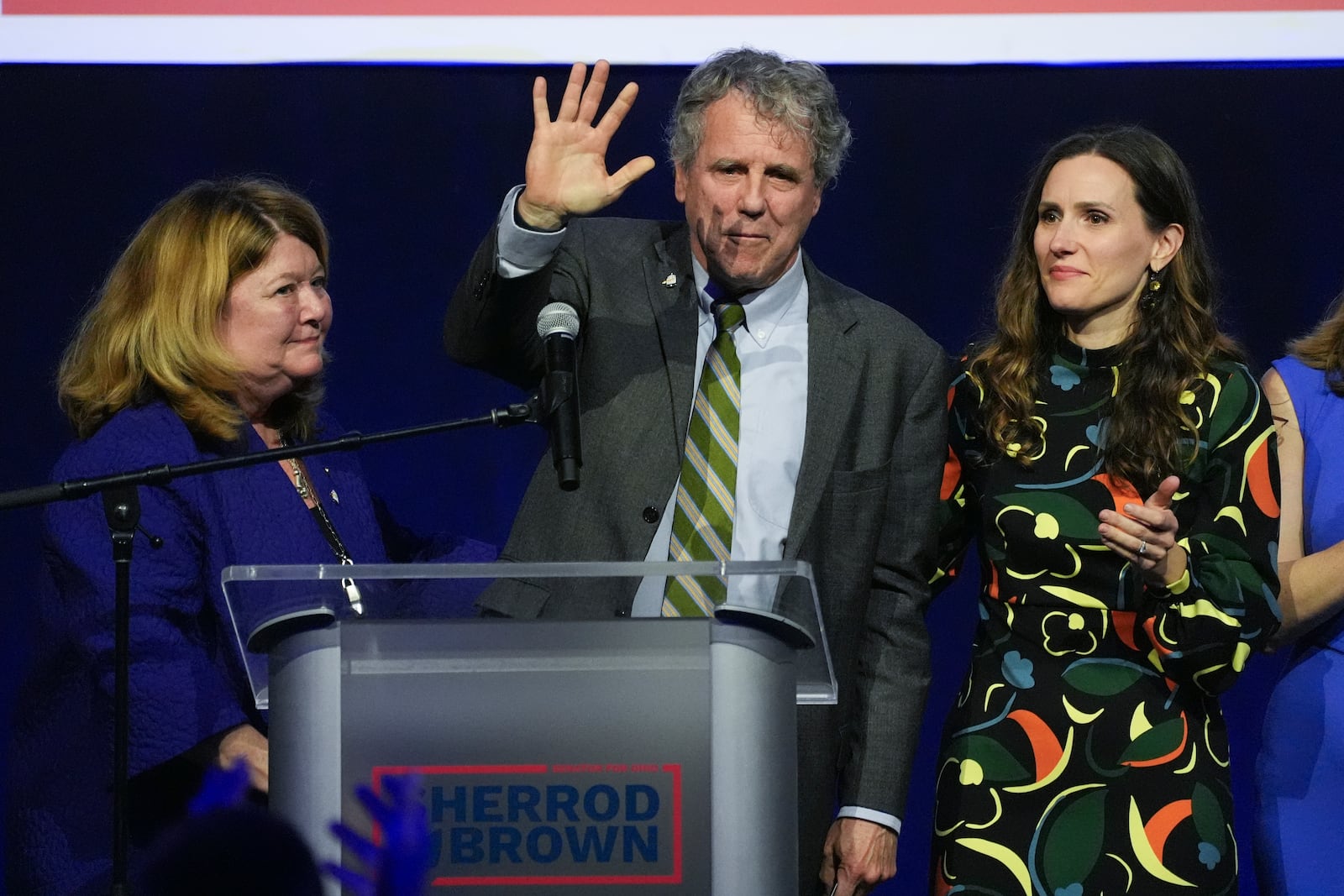 Democratic Ohio Sen. Sherrod Brown speaks during a watch party on election night, Tuesday, Nov. 5, 2024, in Columbus, Ohio, next to his wife Connie Schultz, left, and his daughter Elizabeth Brown, right. (AP Photo/Joshua A. Bickel)