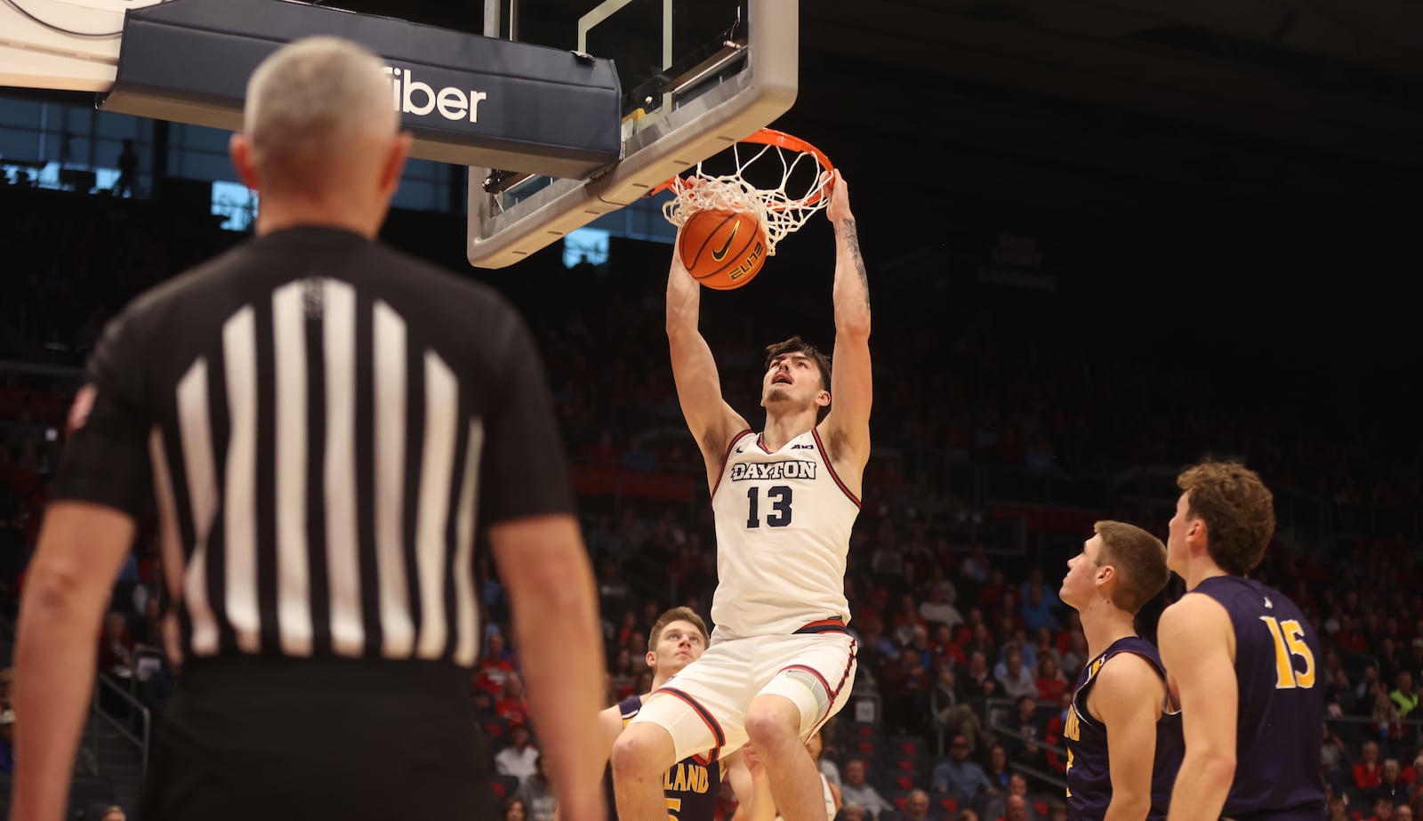 Dayton's Isaac Jack dunks against Ashland in an exhibition game on Saturday, Oct. 26, 2024, at UD Arena. David Jablonski/Staff