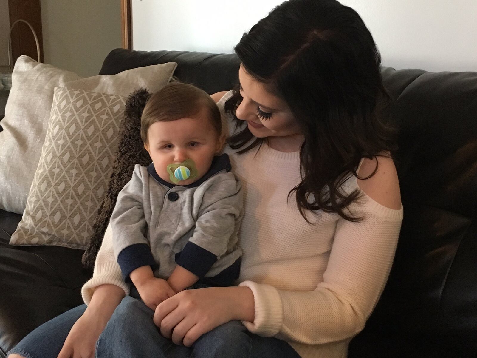 Miami Township resident Abigail Martin holds her son Aston, 22-months, whose medication to treat potentially deadly seizures was $180,000 for an eight-week treatment. KATIE WEDELL/STAFF