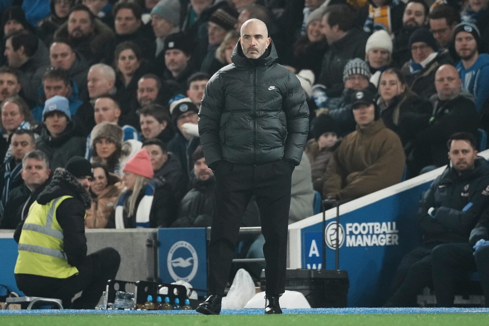 Chelsea's head coach Enzo Maresca stands during the English Premier League soccer match between Brighton and Chelsea in Brighton, England, Friday, Feb. 14, 2025. (AP Photo/Dave Shopland)