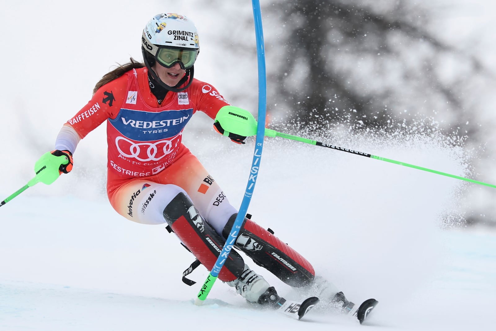 Switzerland's Camille Rast speeds down the course during an alpine ski, women's World Cup slalom, in Sestriere, Italy, Sunday, Feb. 23, 2025. (AP Photo/Marco Trovati)