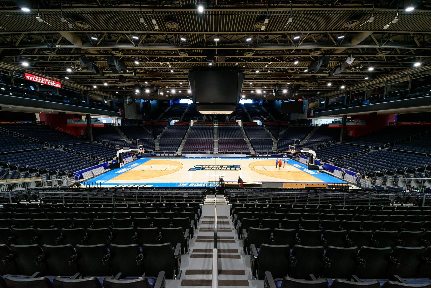 PHOTOS: NCAA First Four basketball court installation at UD Arena