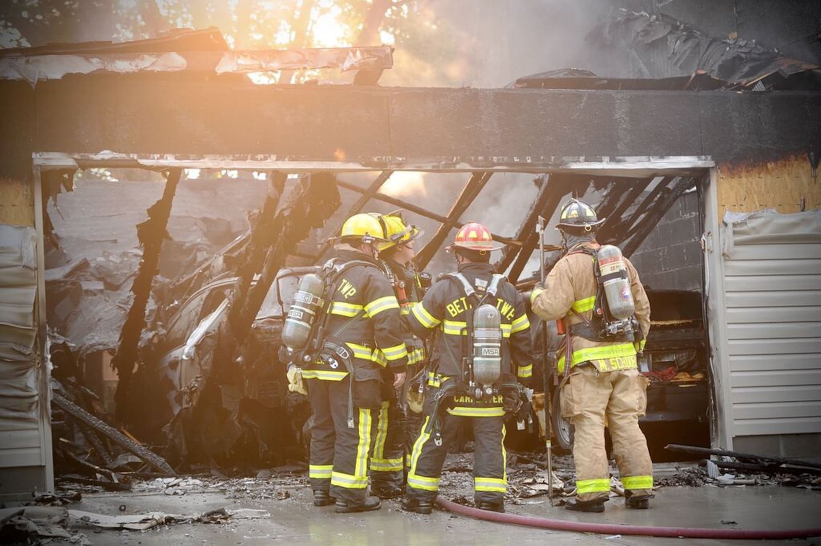 A house in Park Layne was destroyed by fire Saturday. Fire officials said the fire was started by fireworks. MARSHALL GORBY/ STAFF