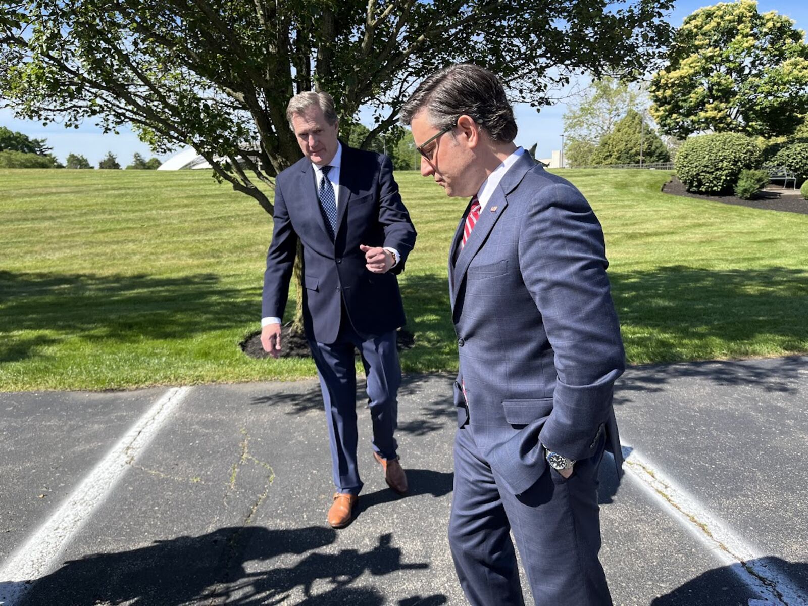 House Speaker Mike Johnson, R-La. (right), and U.S. Rep. Mike Turner, R-Dayton, prepare to speak to the media Friday just outside Wright-Patterson Air Force Base at the Hope Hotel and Conference Center. THOMAS GNAU/STAFF