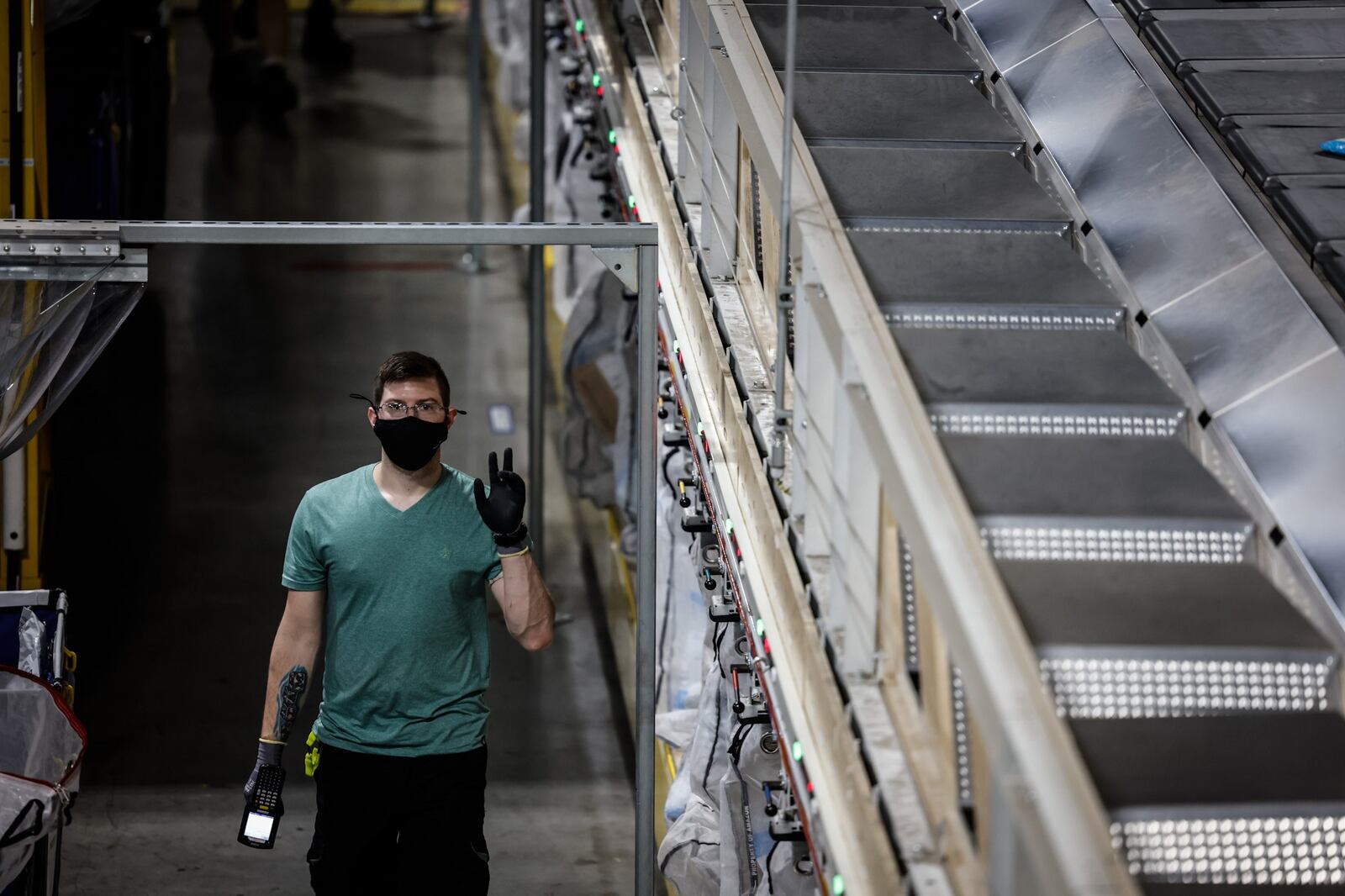 An Amazon employee at Wilmington Air Park in July 2021. 