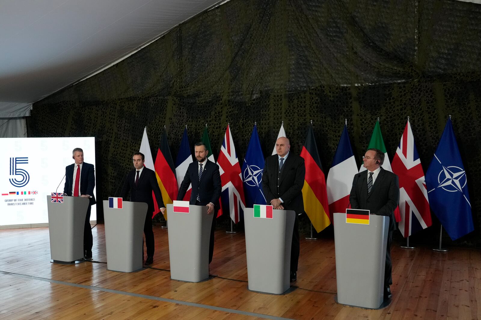 From left: Luke Pollard, Parliamentary Under-Secretary of State in the Britain's Ministry of Defence, France's Minister of the Armed Forces Sebastien Lecornu, Poland's Minister of National Defence Wladyslaw Kosiniak-Kamysz, Italy's Minister of Defence Guido Crosetto, and Germany's Federal Minister of Defence Boris Pistorius attend a news conference after a meeting of defense ministers of five NATO countries to discuss coordinating their defense plans and support for Ukraine, in the village of Helenow, near Warsaw, Poland, Monday, Jan. 13, 2025. (AP Photo/Czarek Sokolowski)