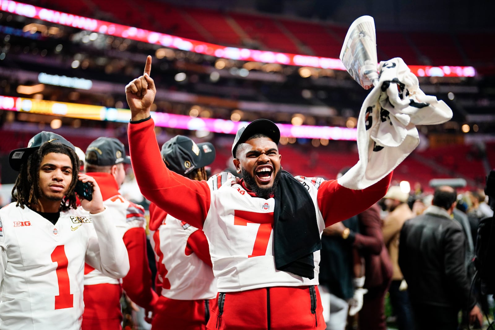 Ohio State offensive lineman Josh Simmons celebrates after the College Football Playoff national championship game Monday, Jan. 20, 2025, in Atlanta. (AP Photo/Jacob Kupferman)