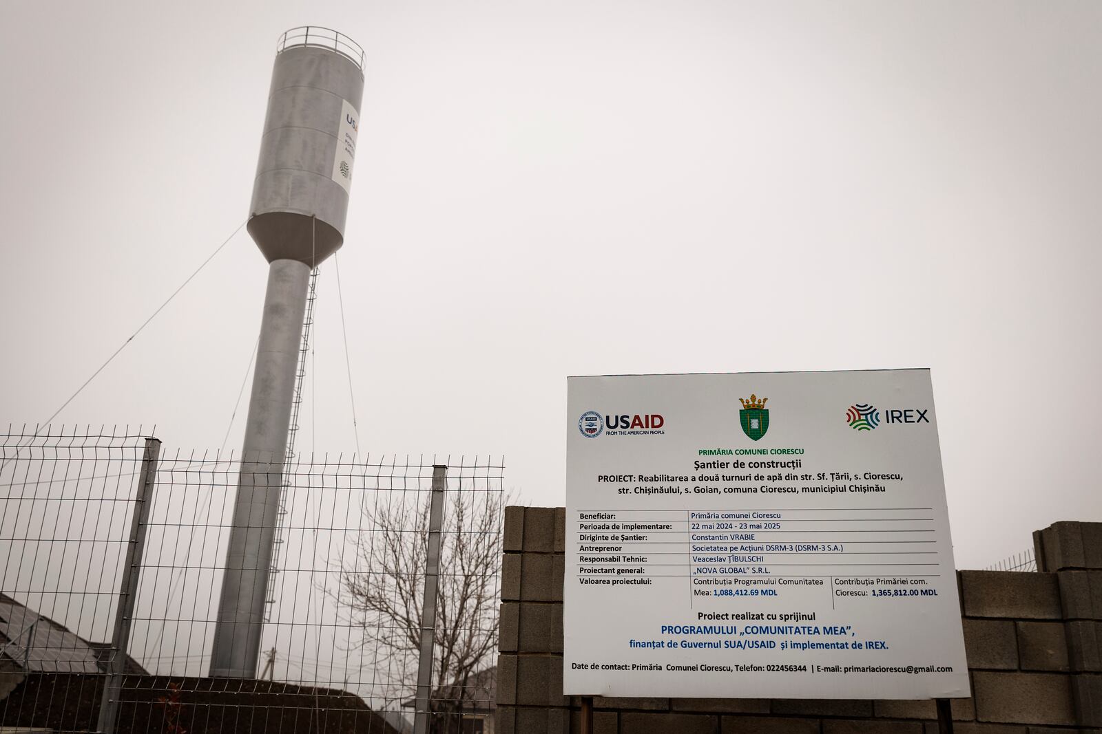 A banner presents a USAID supported project for the rehabilitation of two water towers in the village of Ciorescu, Moldova, Thursday, Jan. 30, 2025. (AP Photo/Aurel Obreja)