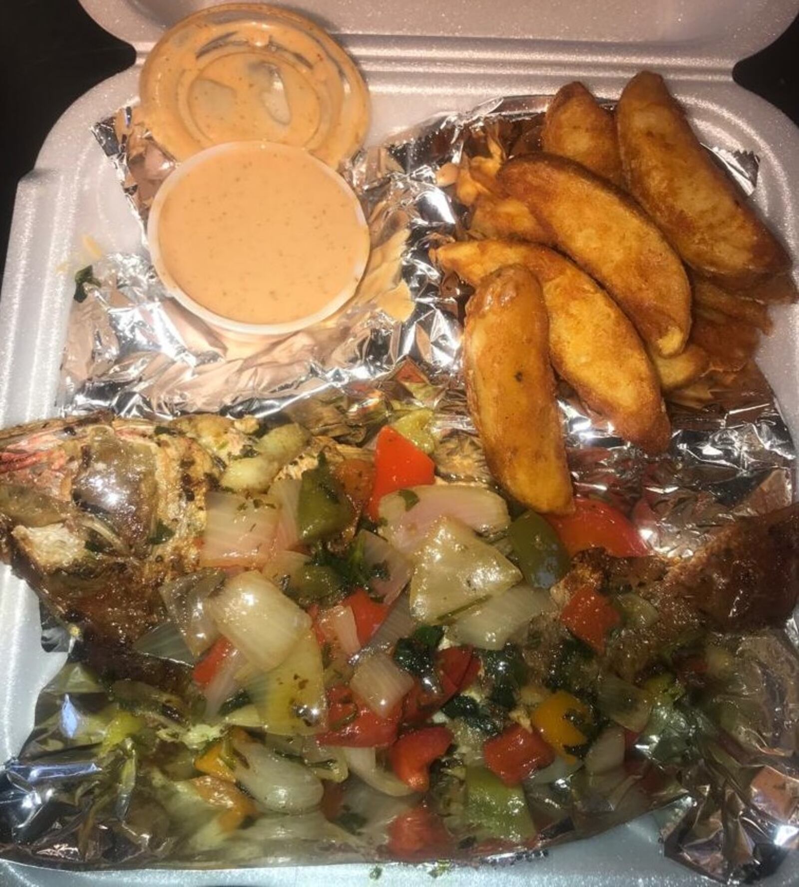 Theresa Barnes  and her family opened Eden Spice in early Jan. 2019.  Red snapper and potato wedges are pictured.