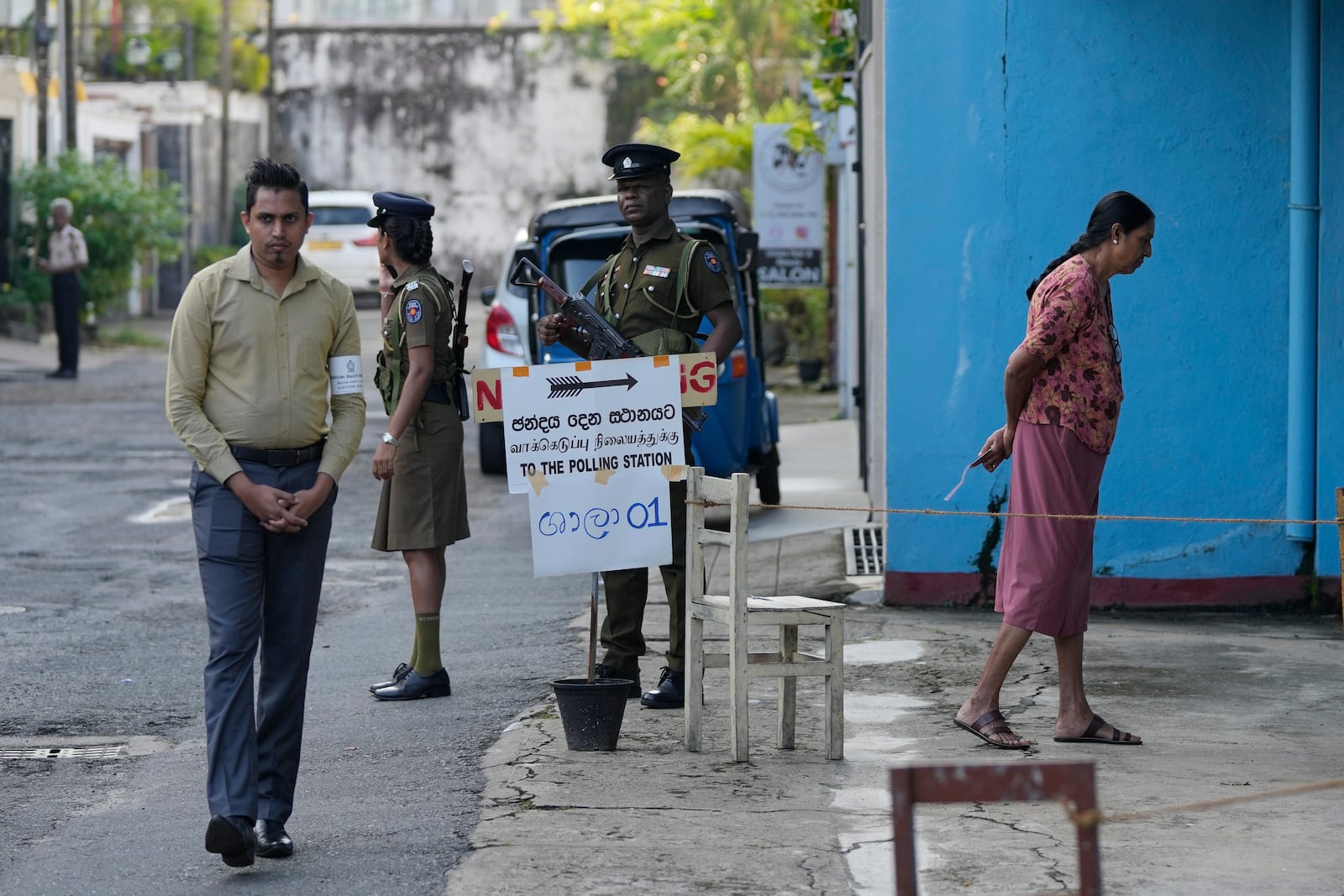 People arrive to cast their votes at a polling station during the parliamentary election in Colombo, Sri Lanka, Thursday, Nov. 14, 2024.(AP Photo/Eranga Jayawardena)