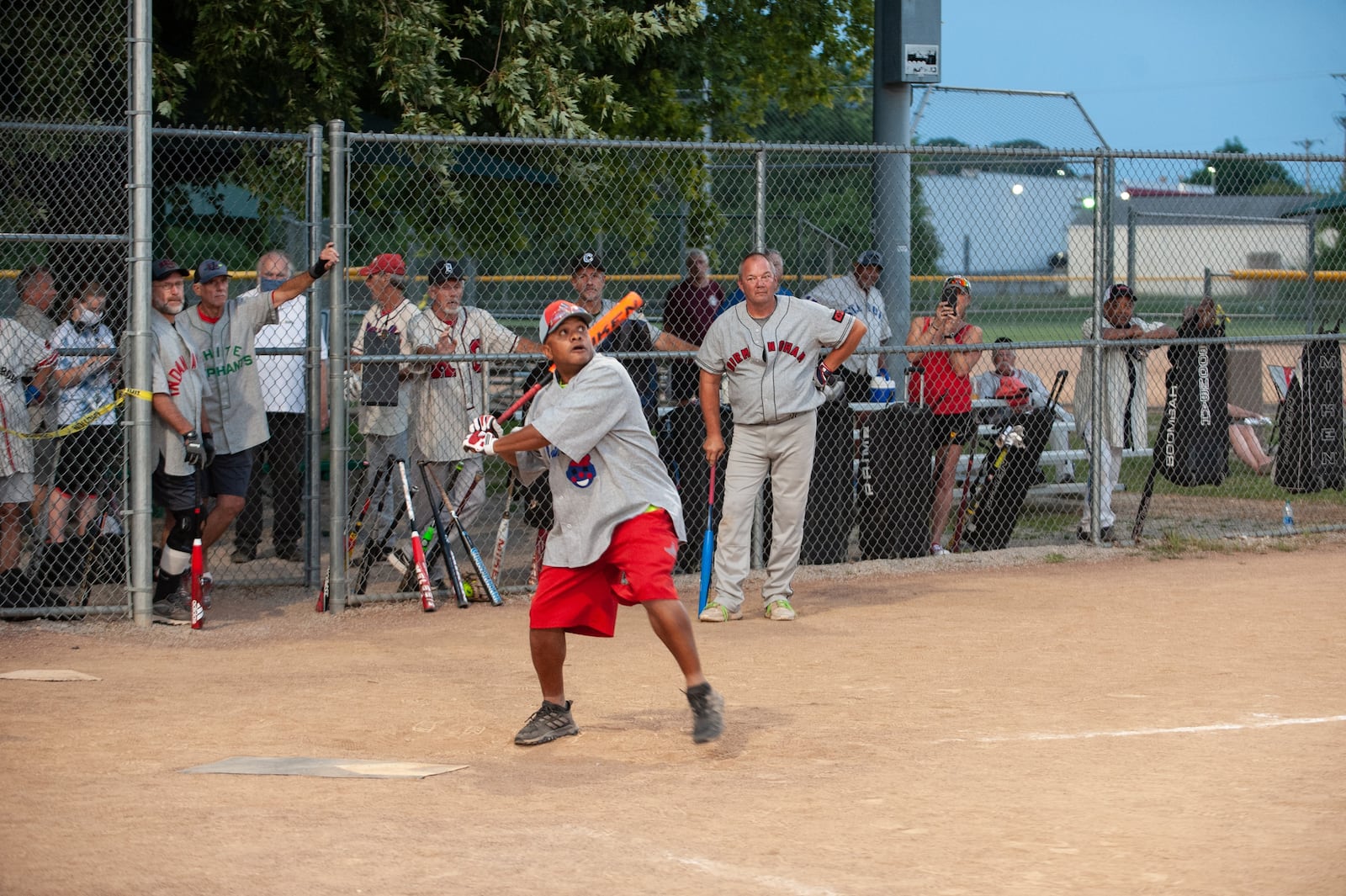 Wearing a Miami Ethiopians jersey, Myles ‘ChillyMac” McPherson takes a swing at Negro Leagues tribute in Fairborn this week. Aaron Paschal/CONTRIBUTED