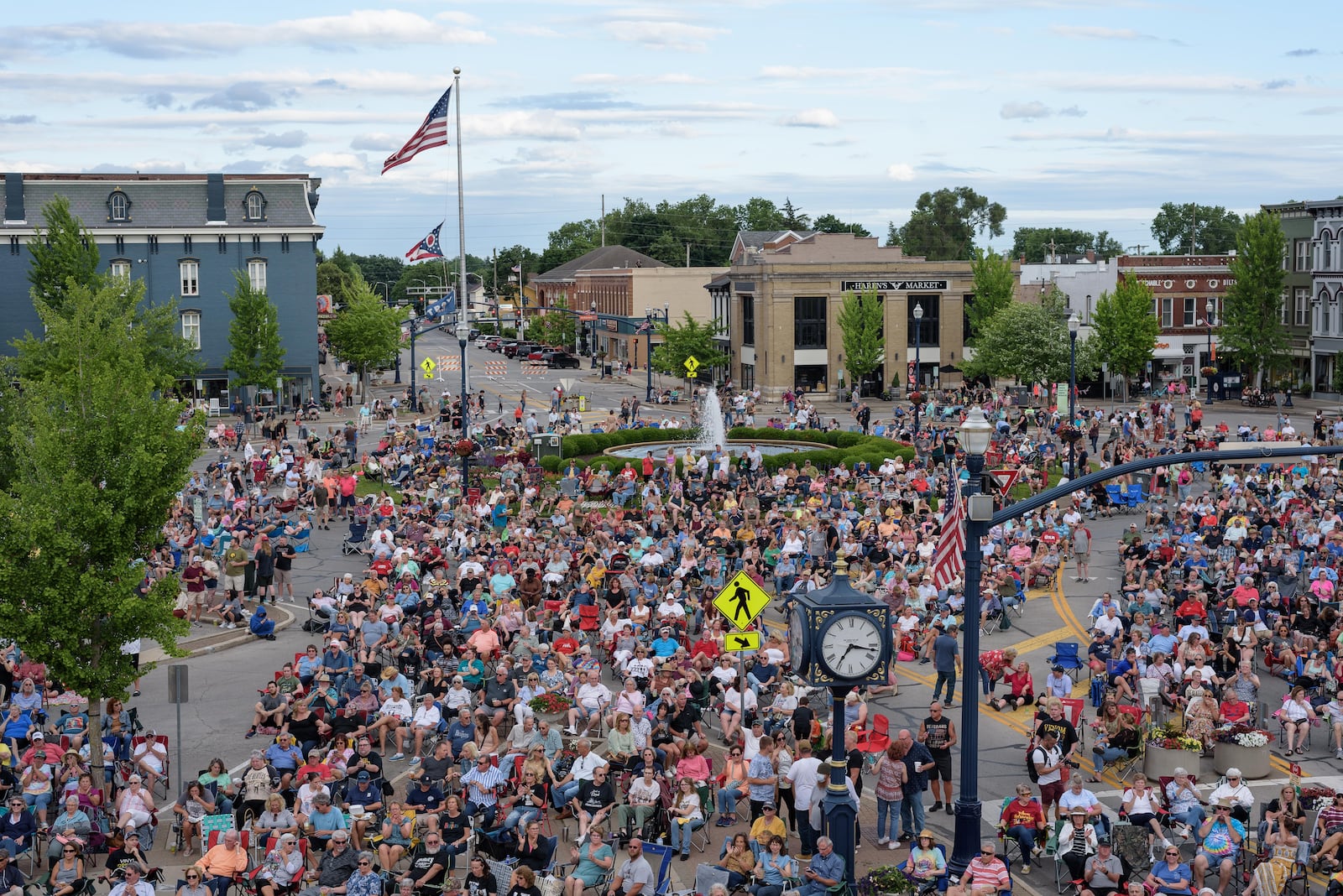 Come Together, a rooftop tribute to The Beatles, performed a free concert atop the historic Mayflower building facing downtown Troy’s Prouty Plaza, June 8, 2024. TOM GILLIAM / CONTRIBUTING PHOTOGRAPHER