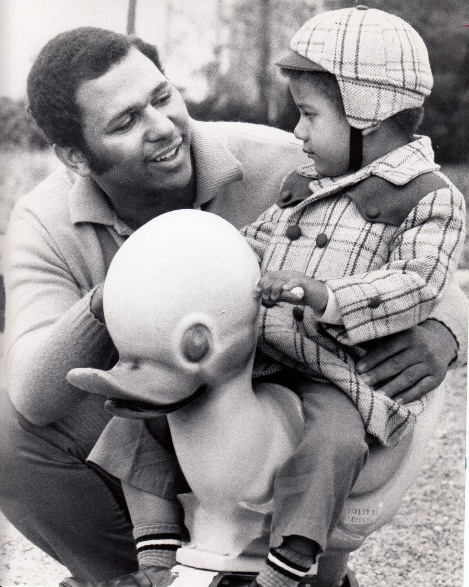 Fred Holley is among the first single men in the United States to adopt a child.  The Dayton Daily News wrote about this accomplishment in 1970. Holley is pictured with his son, Frederick Leon. 